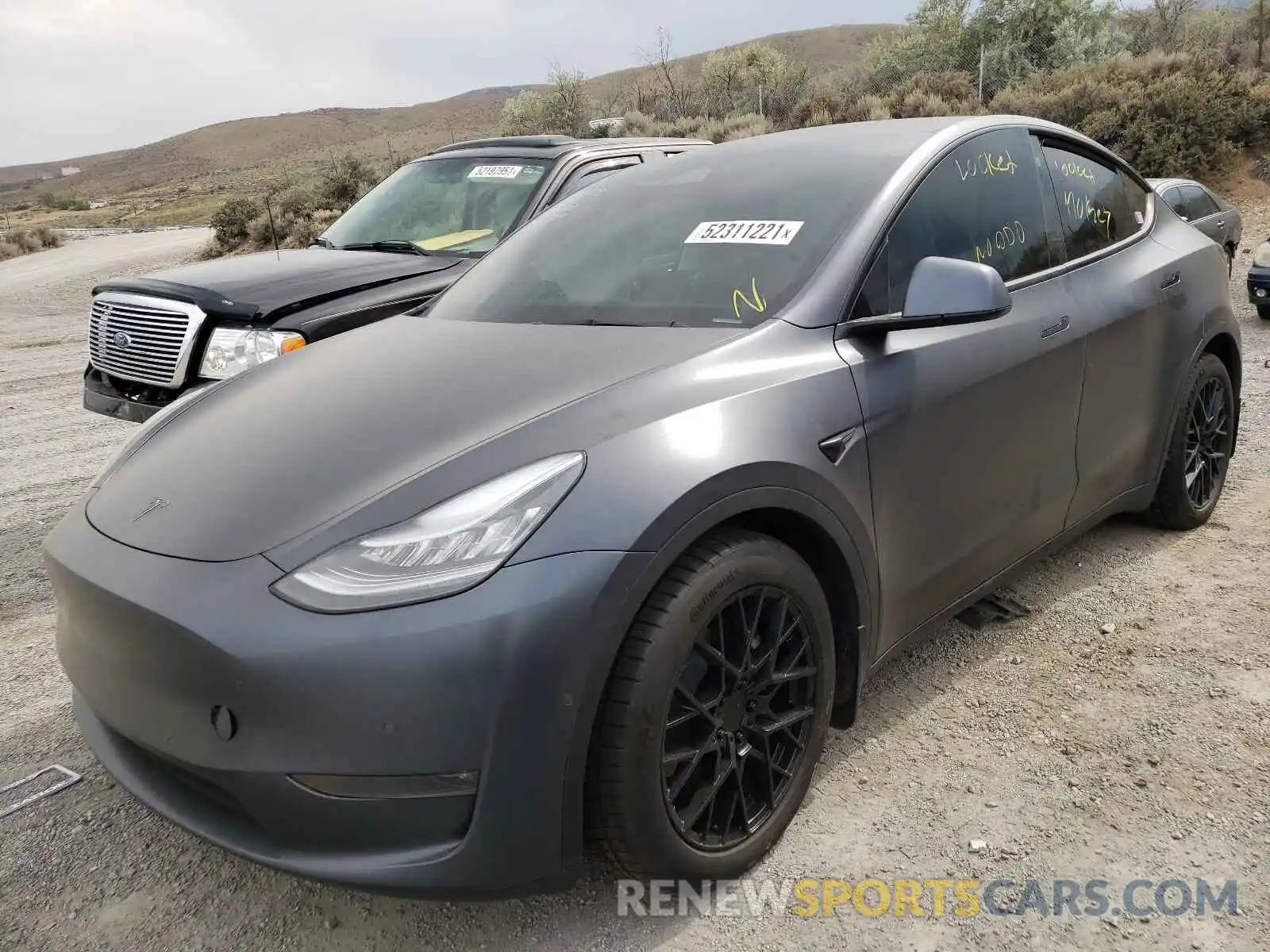 2 Photograph of a damaged car 5YJYGDEE9MF094610 TESLA MODEL Y 2021