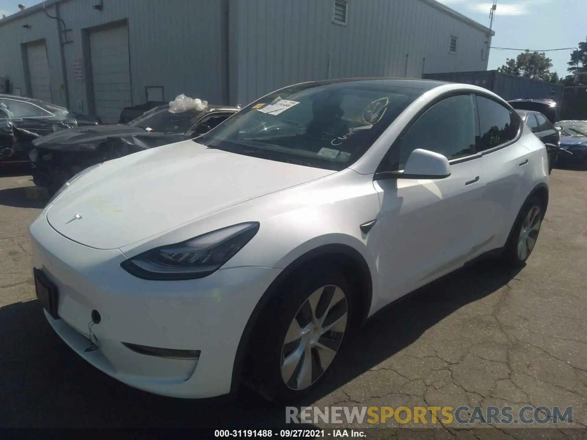 2 Photograph of a damaged car 5YJYGDEE9MF106769 TESLA MODEL Y 2021