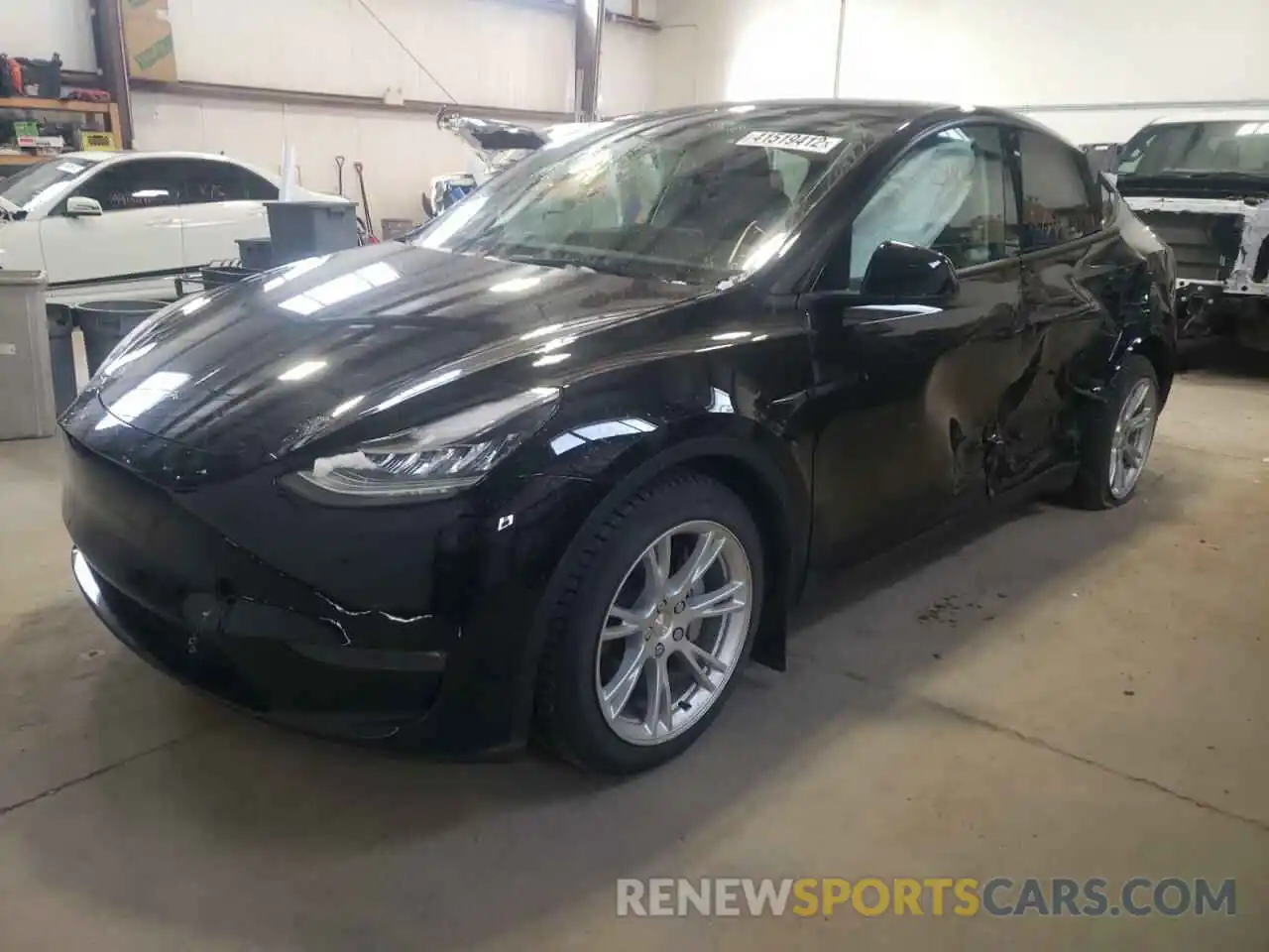 2 Photograph of a damaged car 5YJYGDEE9MF121384 TESLA MODEL Y 2021