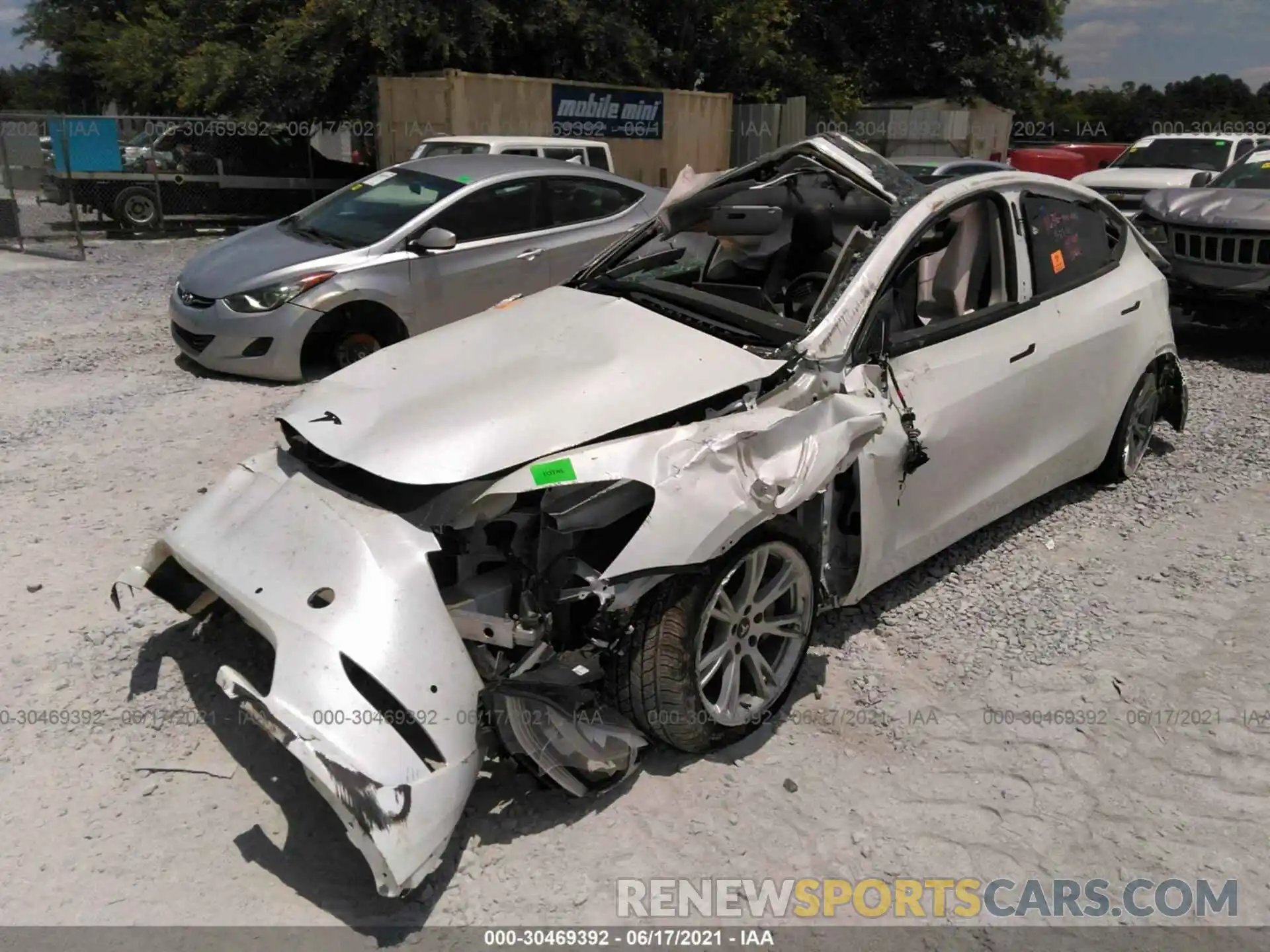 2 Photograph of a damaged car 5YJYGDEE9MF124883 TESLA MODEL Y 2021