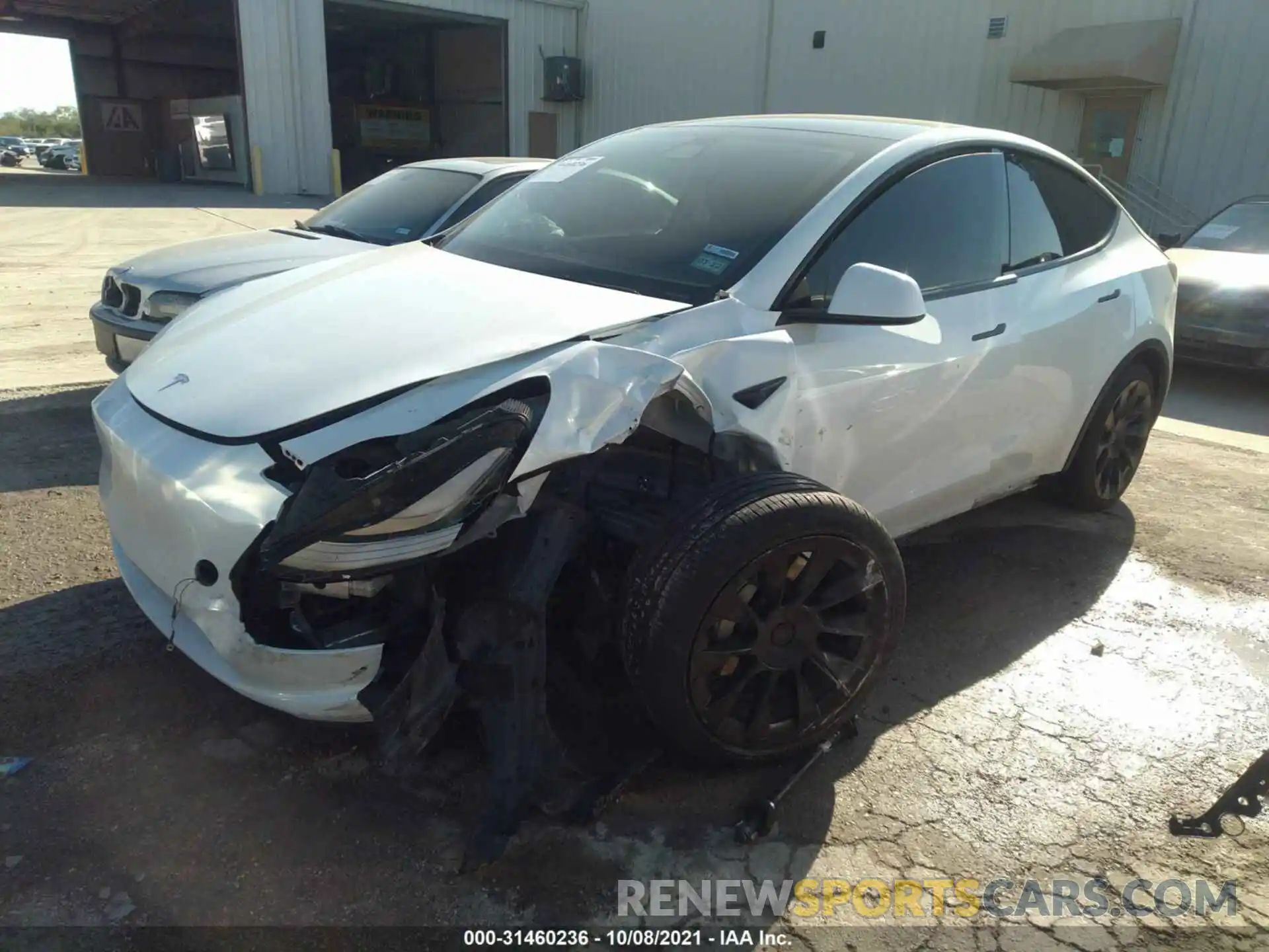 2 Photograph of a damaged car 5YJYGDEE9MF125158 TESLA MODEL Y 2021