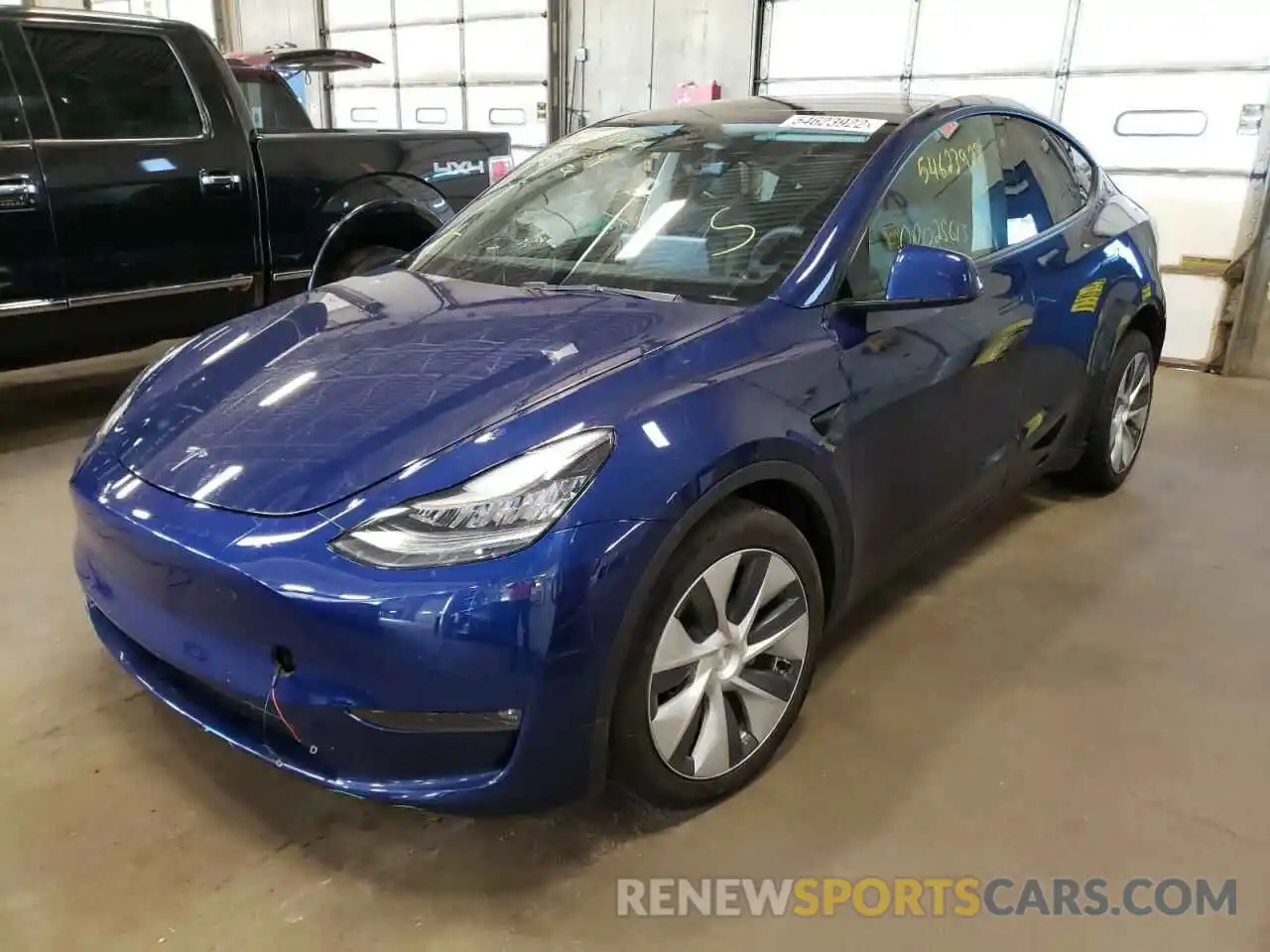 2 Photograph of a damaged car 5YJYGDEE9MF130912 TESLA MODEL Y 2021