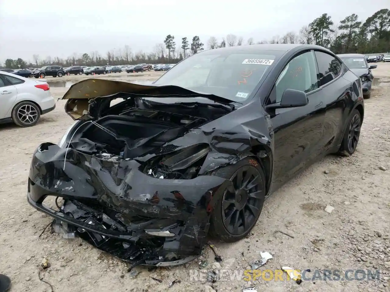 2 Photograph of a damaged car 5YJYGDEE9MF149735 TESLA MODEL Y 2021