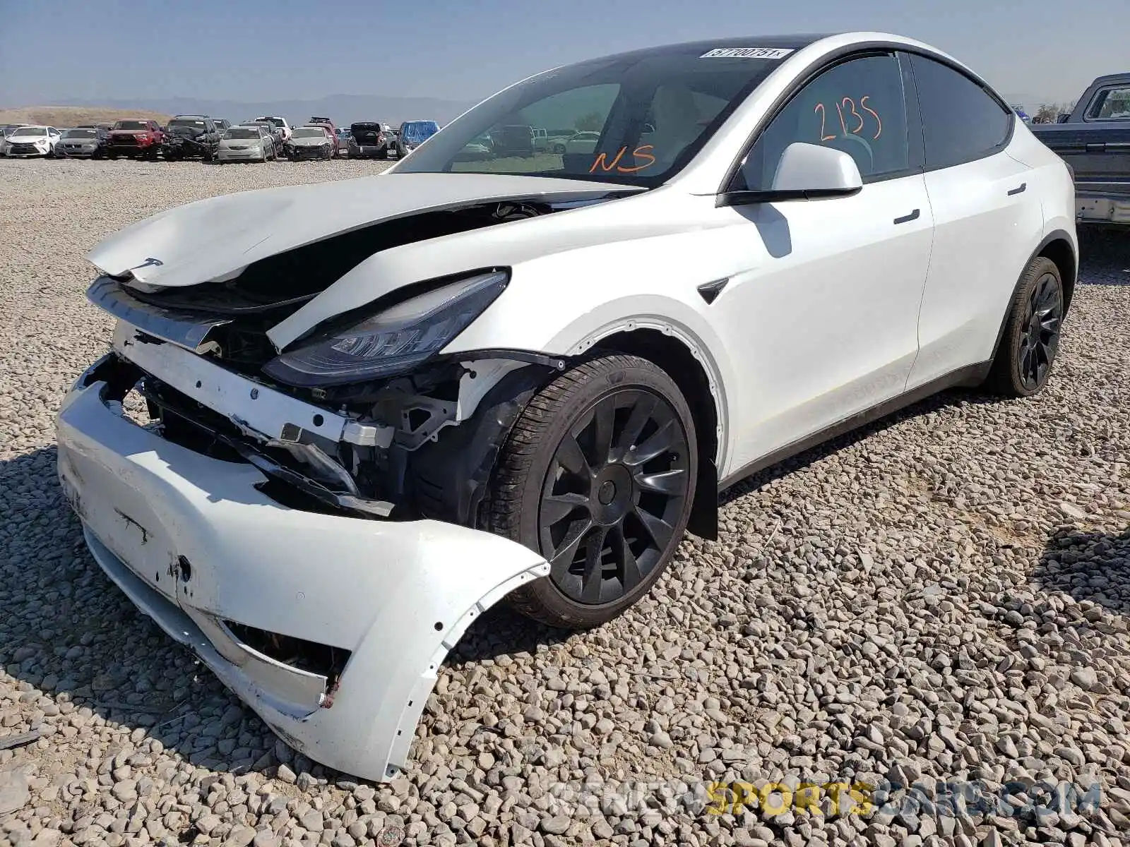 2 Photograph of a damaged car 5YJYGDEE9MF158208 TESLA MODEL Y 2021