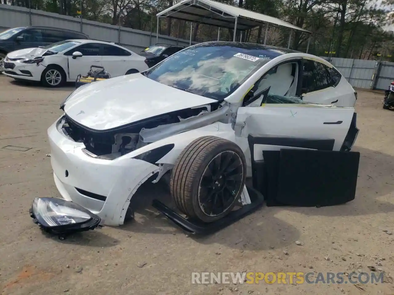 2 Photograph of a damaged car 5YJYGDEE9MF202773 TESLA MODEL Y 2021