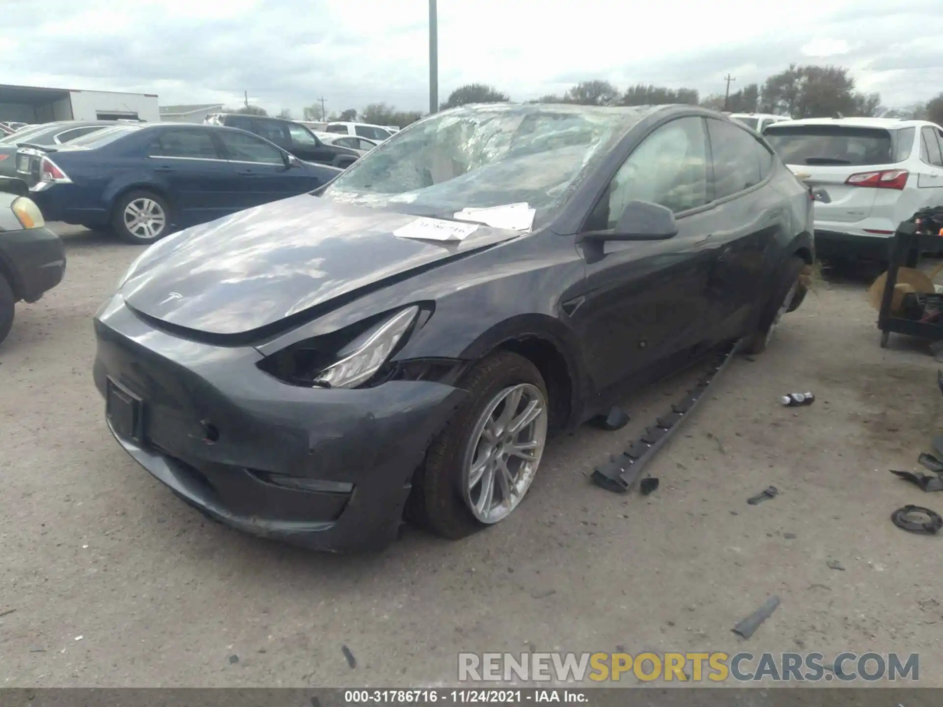 2 Photograph of a damaged car 5YJYGDEE9MF253304 TESLA MODEL Y 2021