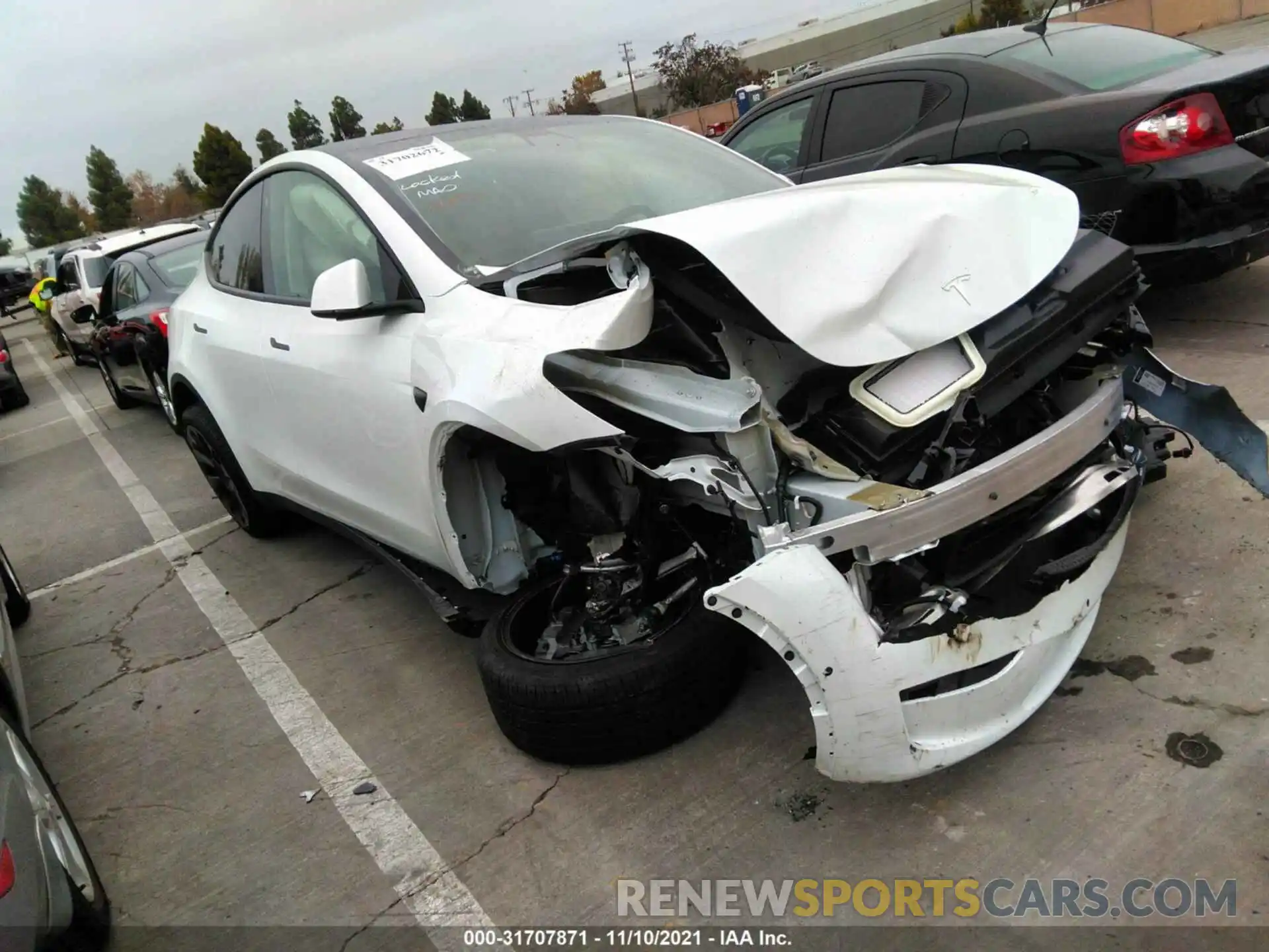 1 Photograph of a damaged car 5YJYGDEE9MF270863 TESLA MODEL Y 2021