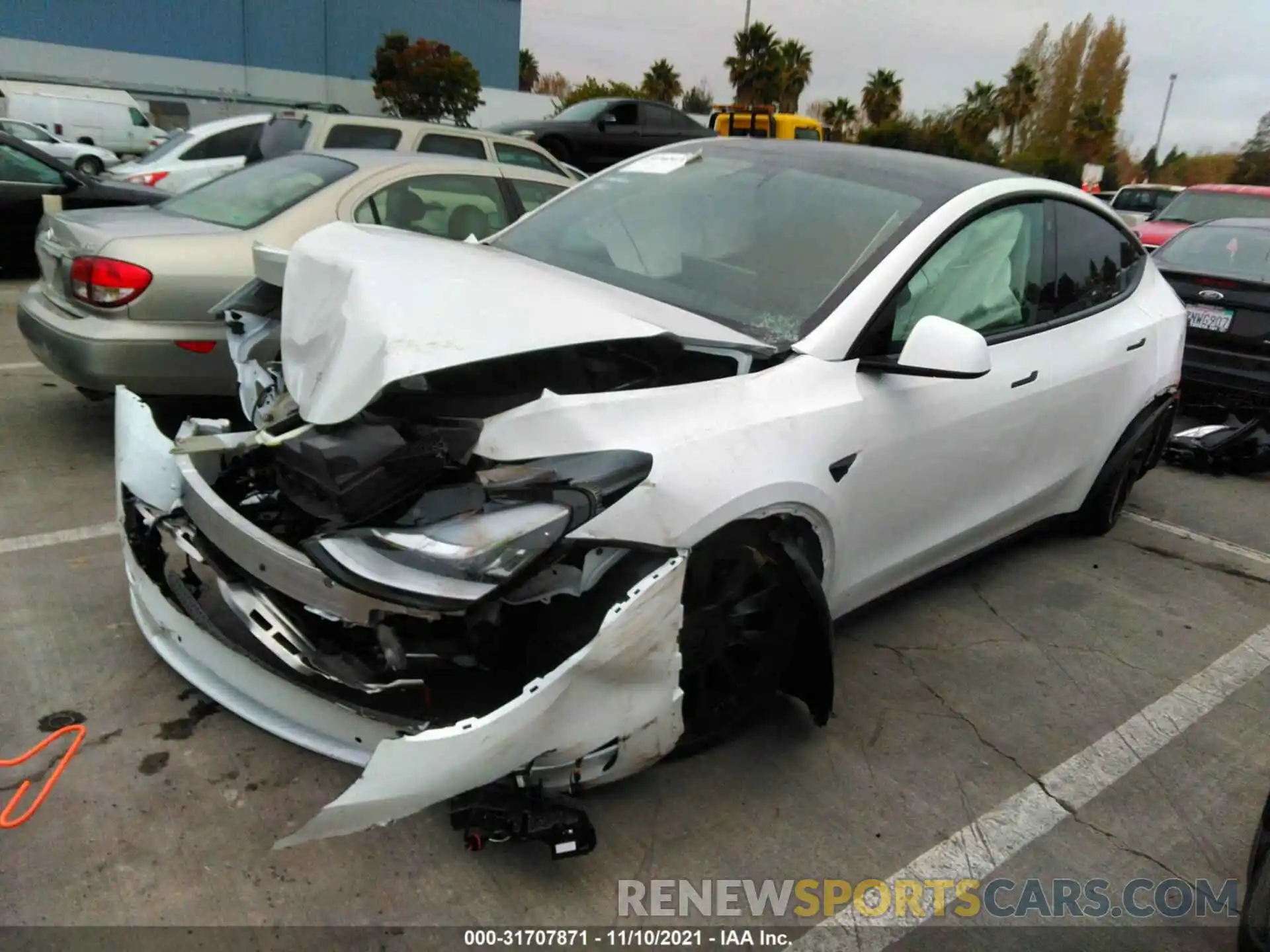 2 Photograph of a damaged car 5YJYGDEE9MF270863 TESLA MODEL Y 2021