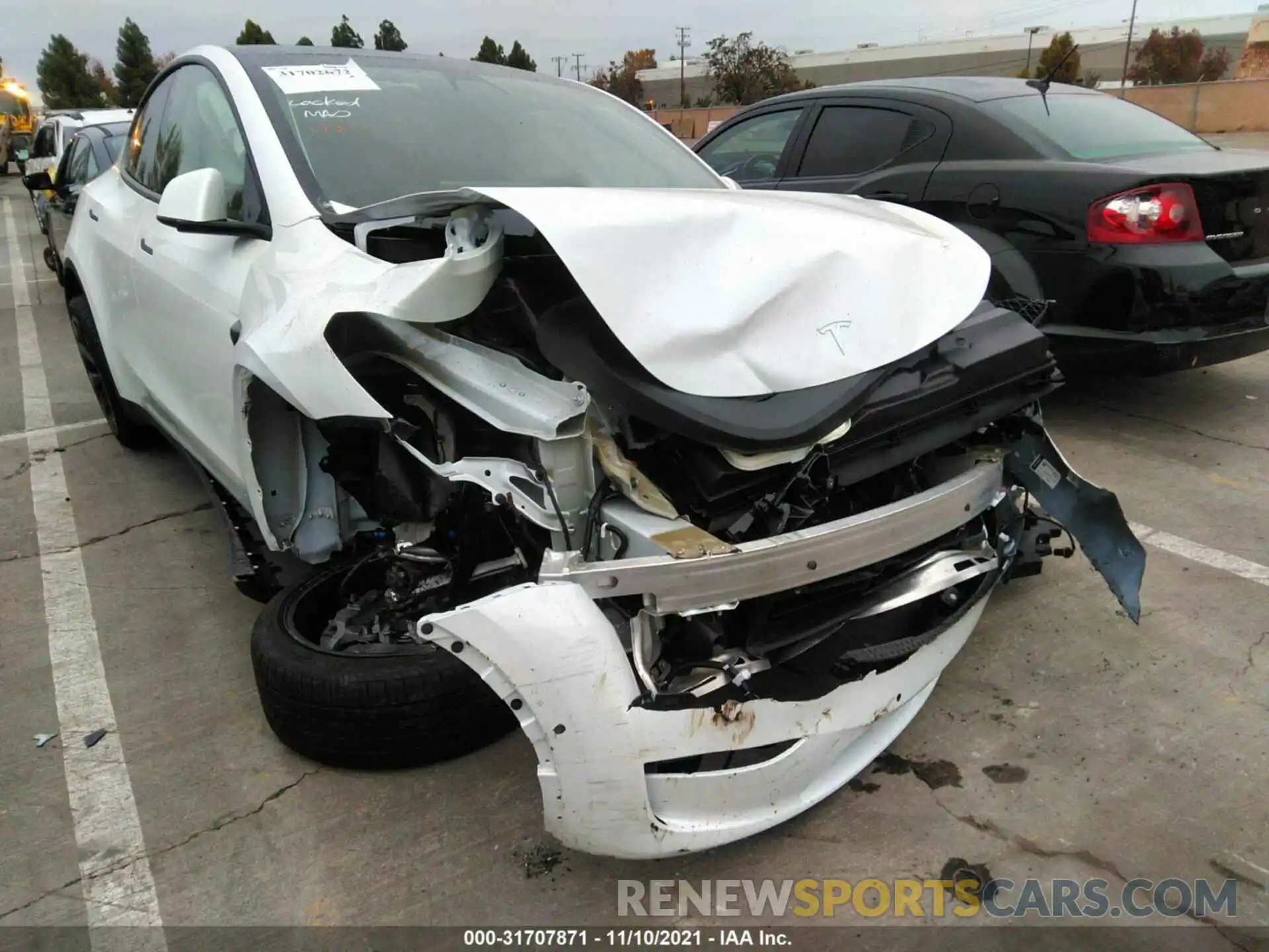 6 Photograph of a damaged car 5YJYGDEE9MF270863 TESLA MODEL Y 2021