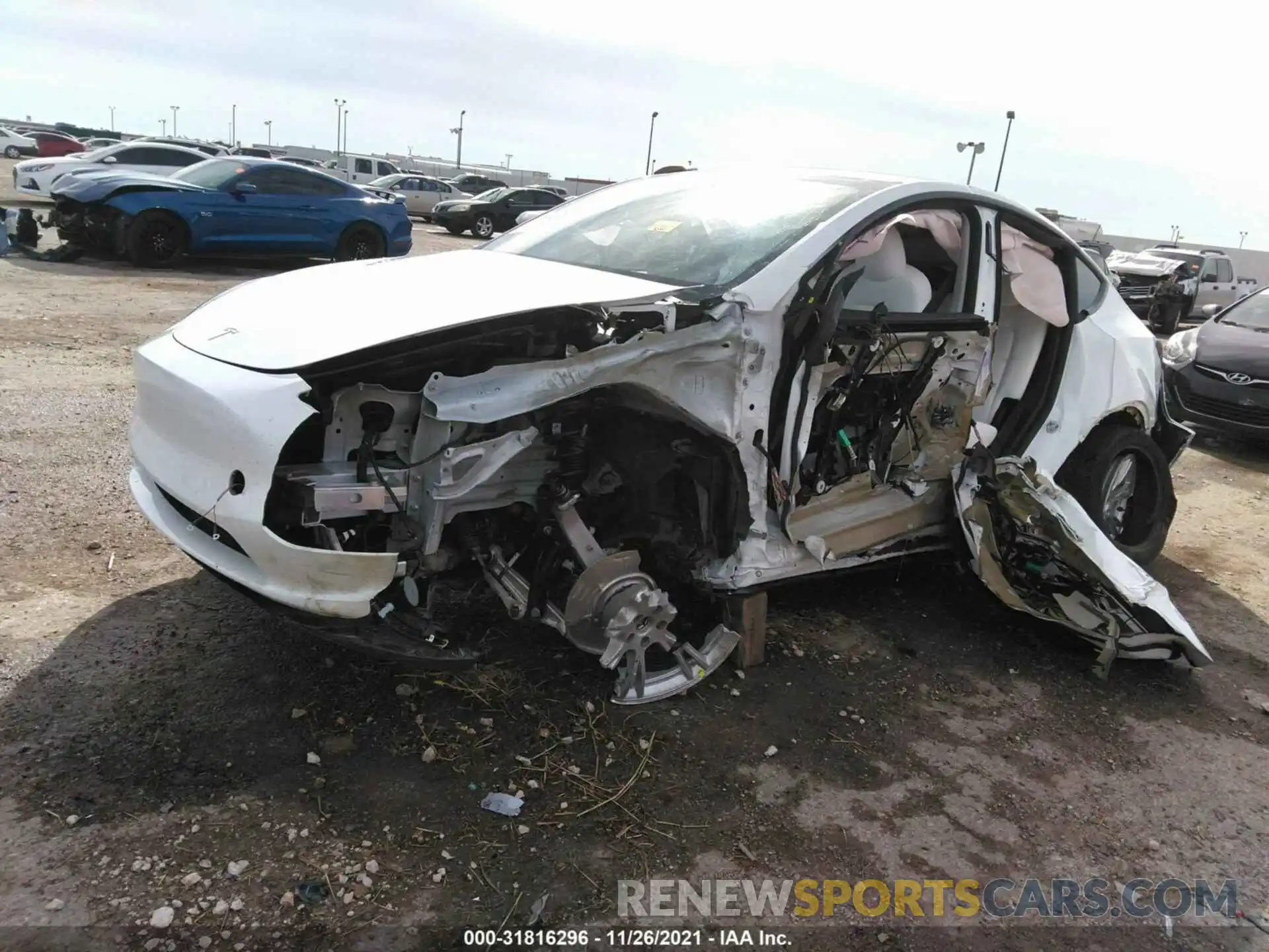 2 Photograph of a damaged car 5YJYGDEE9MF302792 TESLA MODEL Y 2021