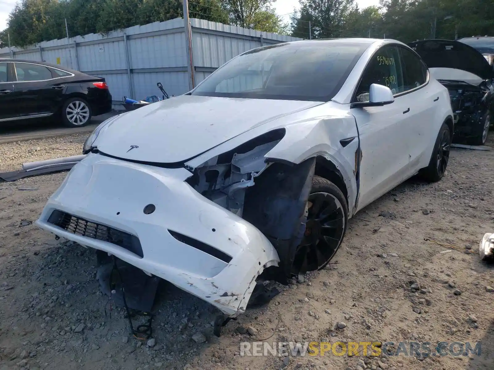 2 Photograph of a damaged car 5YJYGDEEXMF060630 TESLA MODEL Y 2021