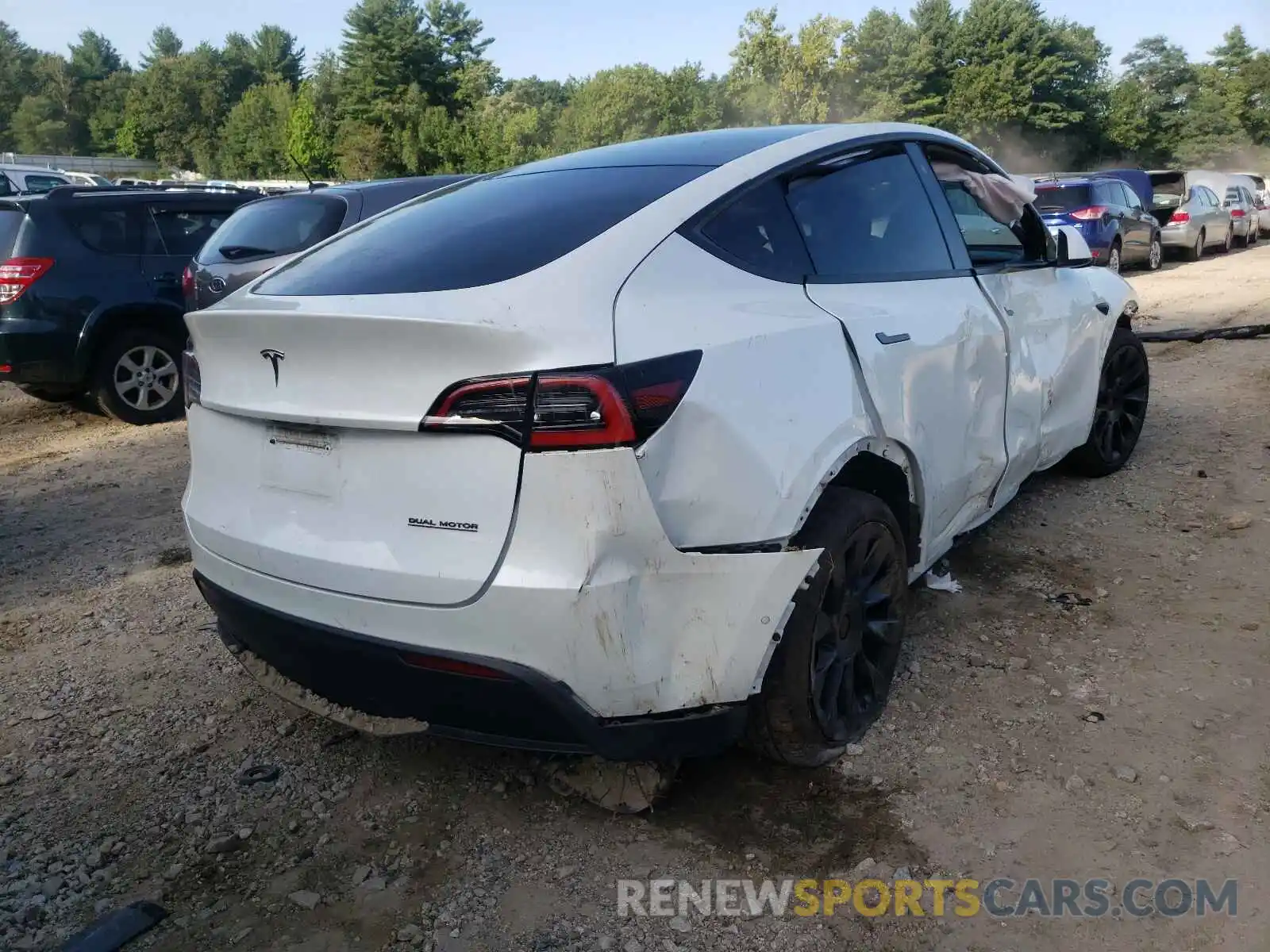 4 Photograph of a damaged car 5YJYGDEEXMF060630 TESLA MODEL Y 2021