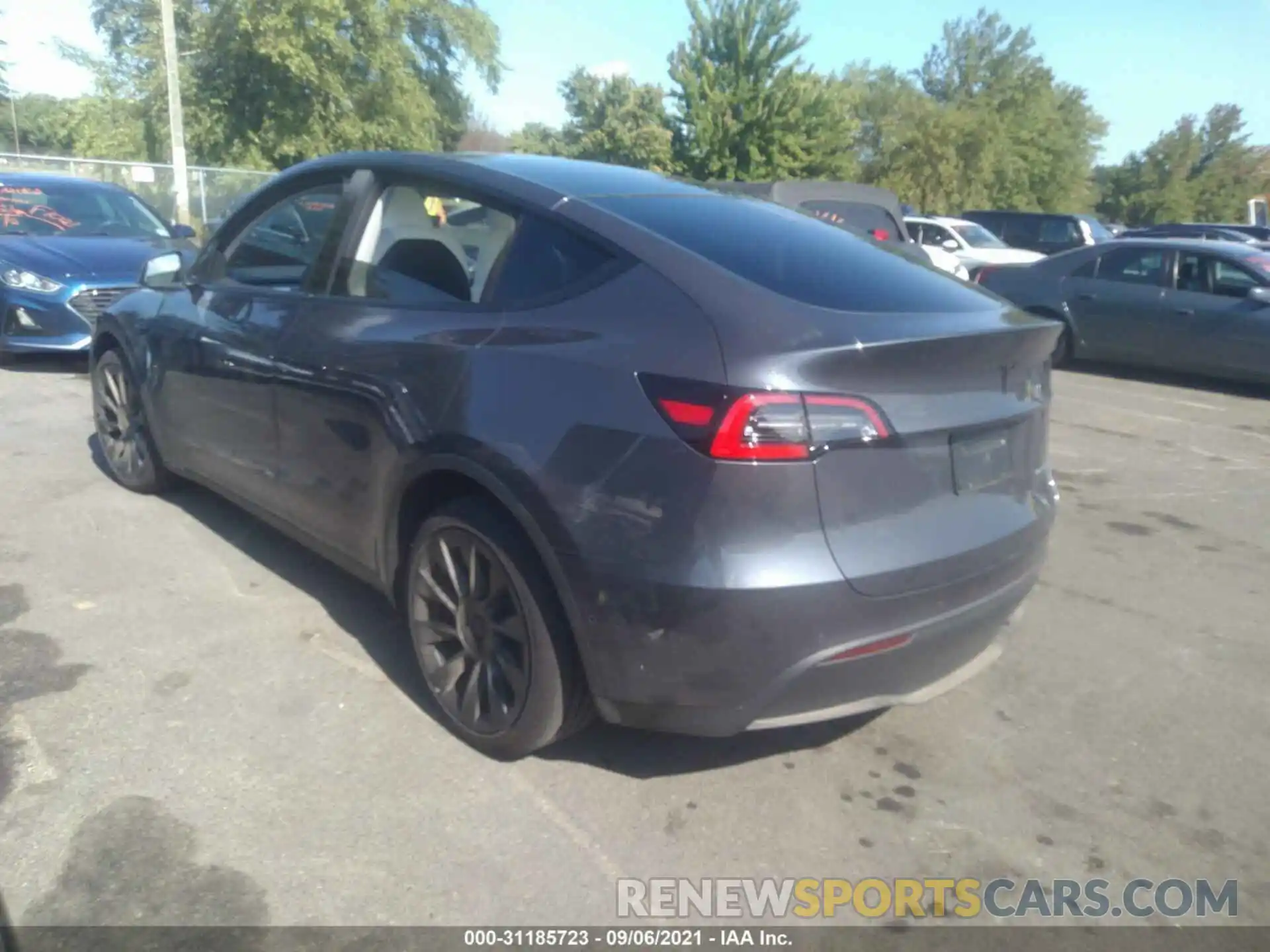 3 Photograph of a damaged car 5YJYGDEEXMF075211 TESLA MODEL Y 2021