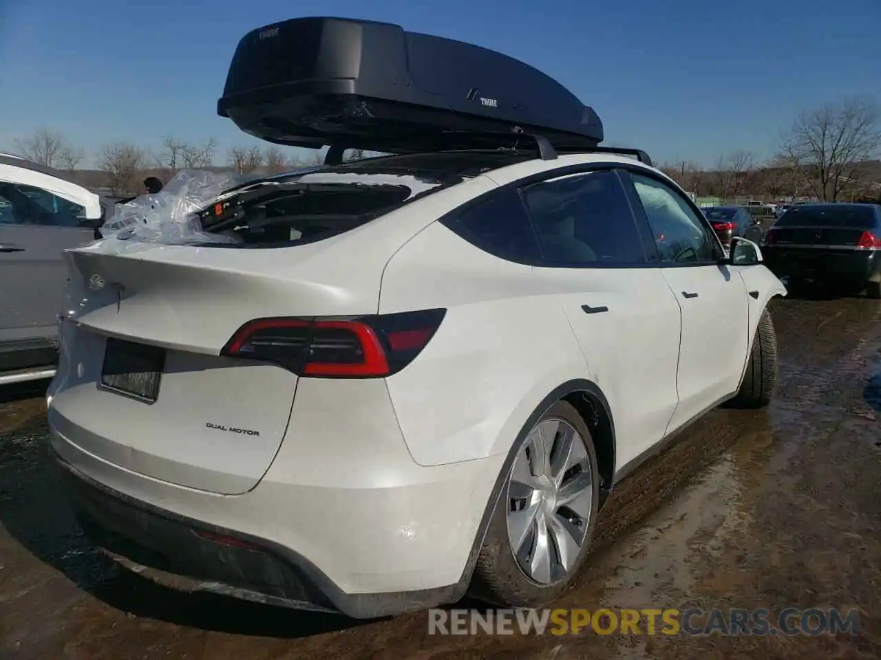 4 Photograph of a damaged car 5YJYGDEEXMF076116 TESLA MODEL Y 2021