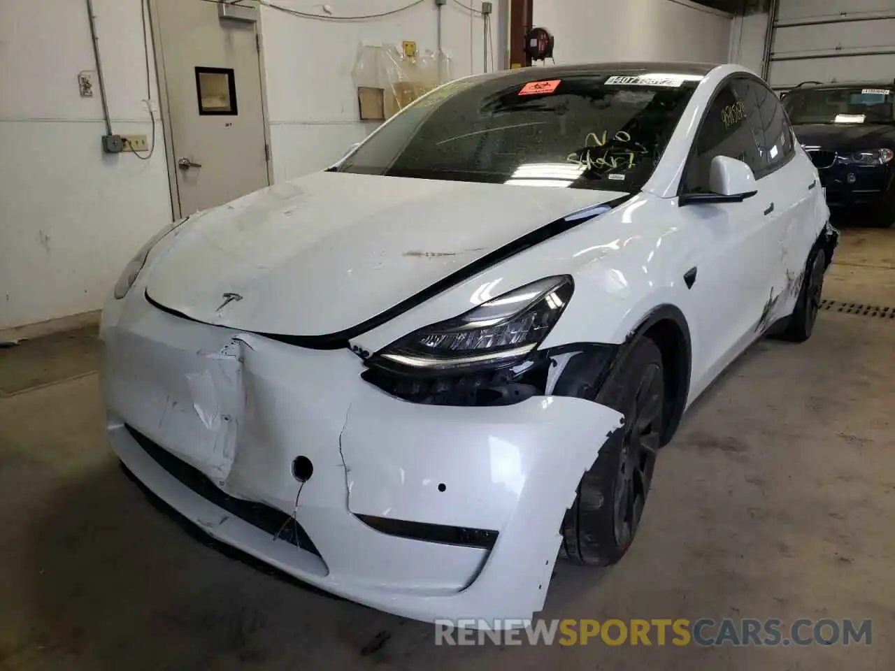 2 Photograph of a damaged car 5YJYGDEEXMF079744 TESLA MODEL Y 2021