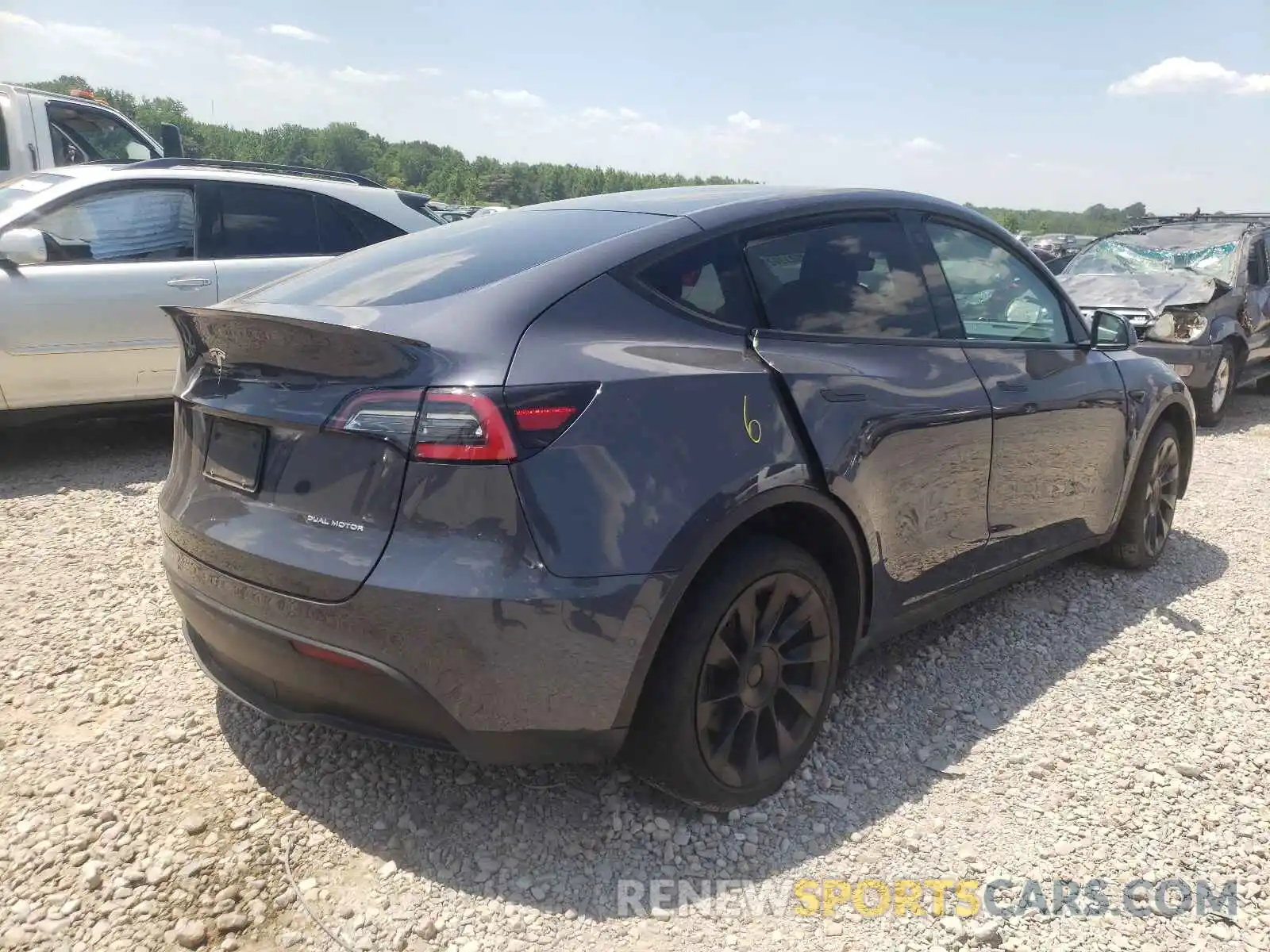 4 Photograph of a damaged car 5YJYGDEEXMF091120 TESLA MODEL Y 2021