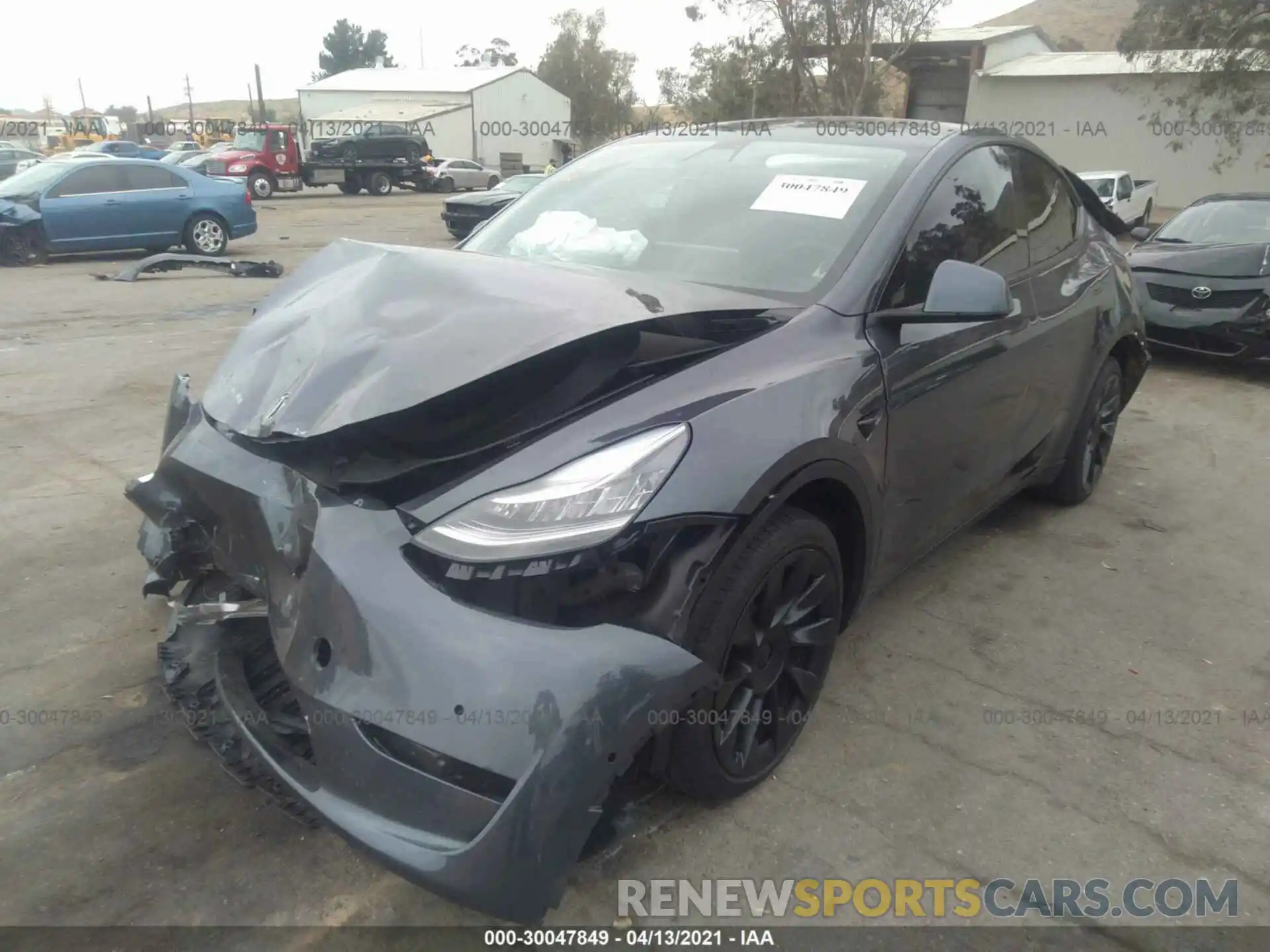 2 Photograph of a damaged car 5YJYGDEEXMF097905 TESLA MODEL Y 2021