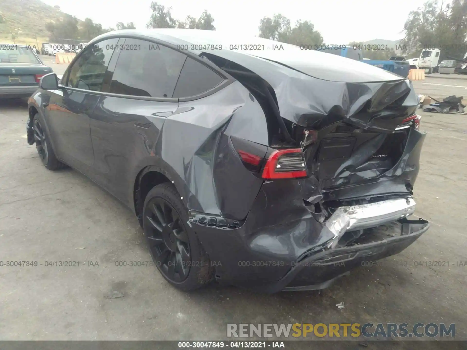 3 Photograph of a damaged car 5YJYGDEEXMF097905 TESLA MODEL Y 2021