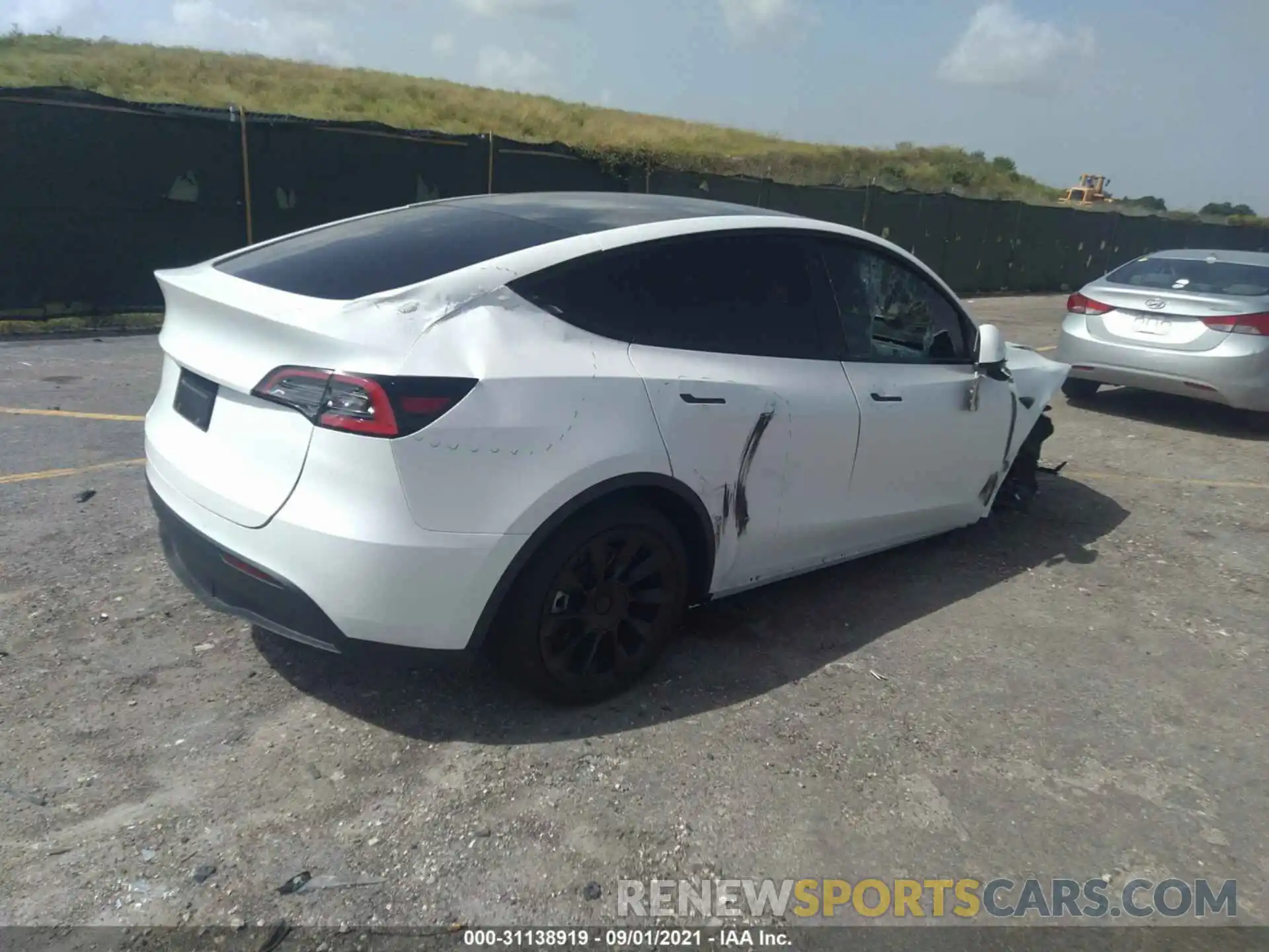 4 Photograph of a damaged car 5YJYGDEEXMF108773 TESLA MODEL Y 2021