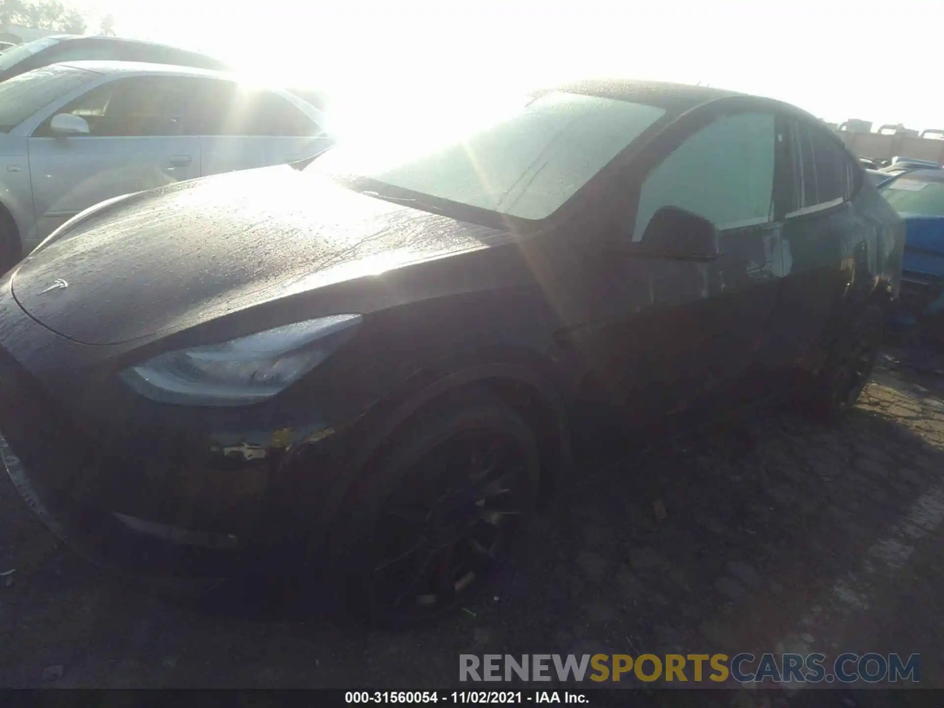 2 Photograph of a damaged car 5YJYGDEEXMF142812 TESLA MODEL Y 2021