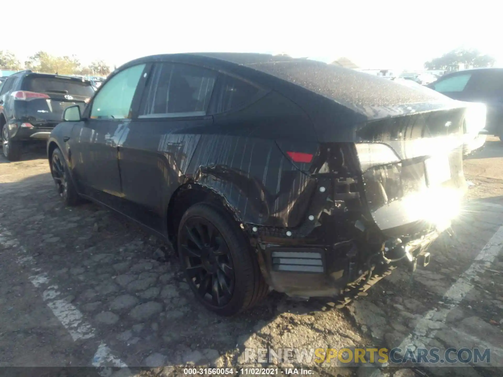 3 Photograph of a damaged car 5YJYGDEEXMF142812 TESLA MODEL Y 2021