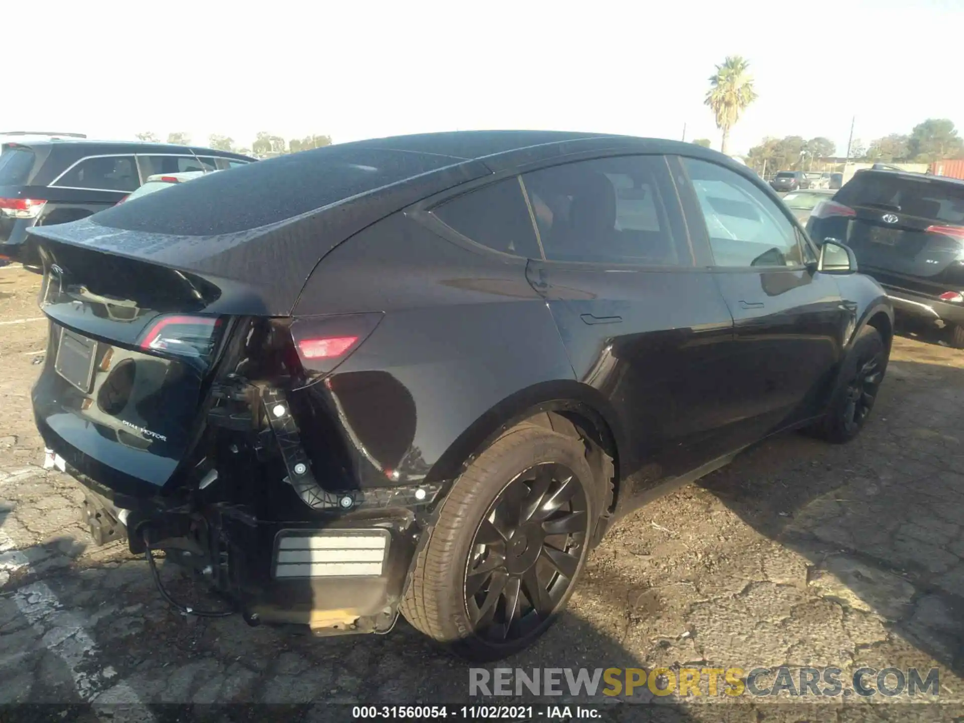 4 Photograph of a damaged car 5YJYGDEEXMF142812 TESLA MODEL Y 2021