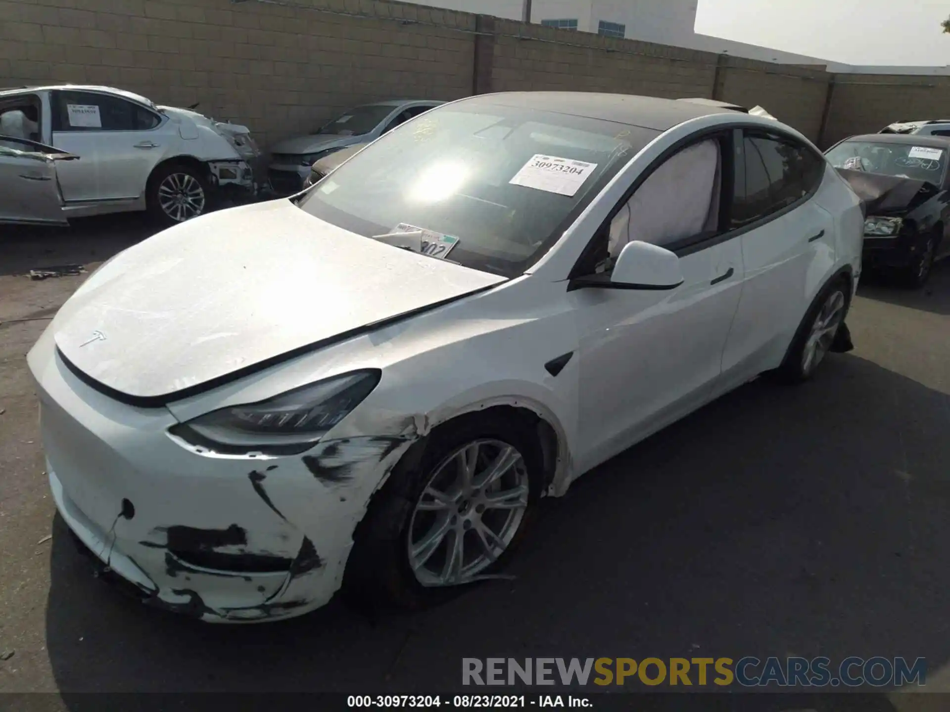 2 Photograph of a damaged car 5YJYGDEEXMF145354 TESLA MODEL Y 2021