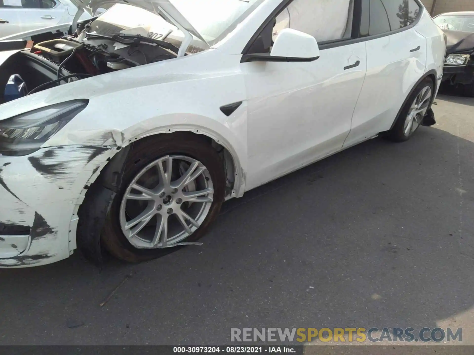 6 Photograph of a damaged car 5YJYGDEEXMF145354 TESLA MODEL Y 2021