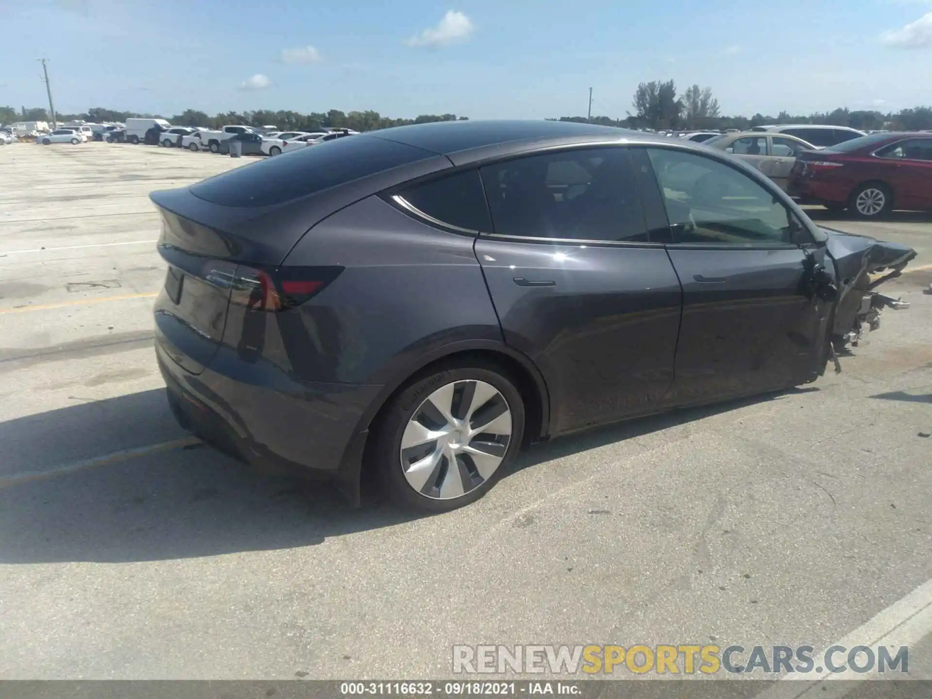 4 Photograph of a damaged car 5YJYGDEEXMF176894 TESLA MODEL Y 2021