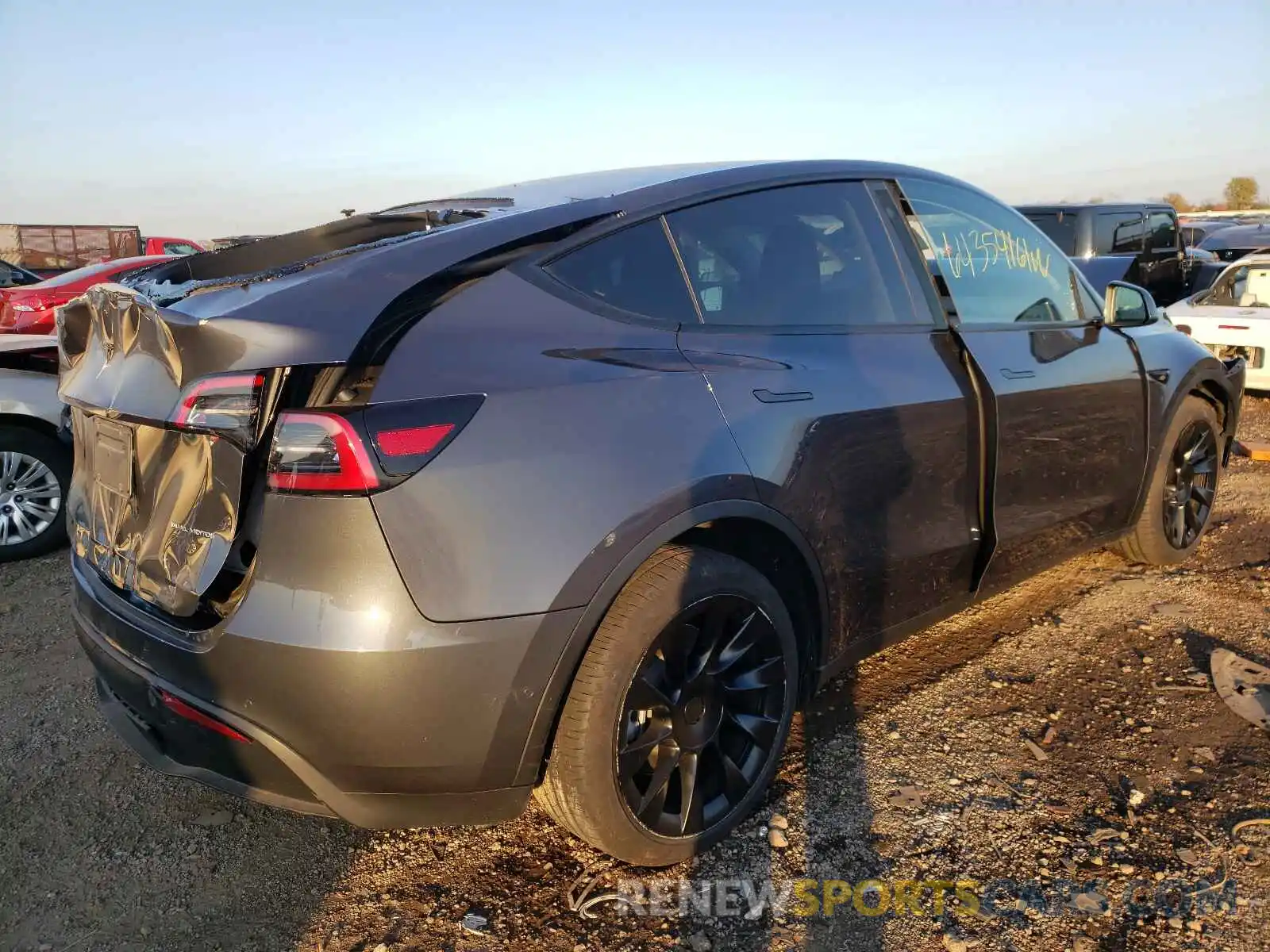 4 Photograph of a damaged car 5YJYGDEEXMF192044 TESLA MODEL Y 2021