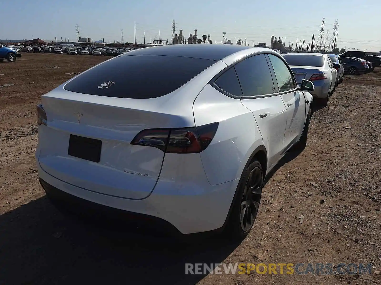 4 Photograph of a damaged car 5YJYGDEEXMF202832 TESLA MODEL Y 2021