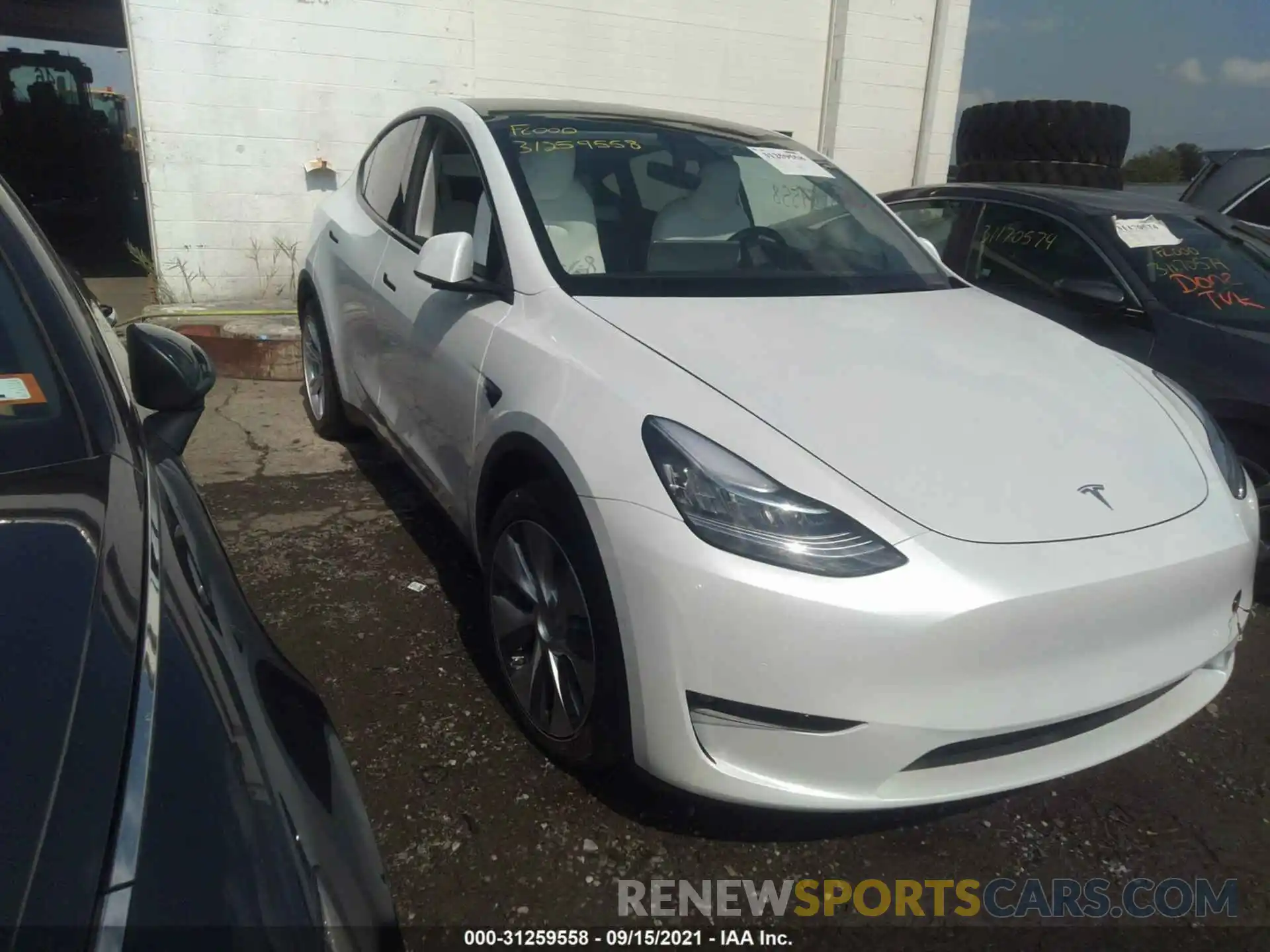 1 Photograph of a damaged car 5YJYGDEEXMF228704 TESLA MODEL Y 2021