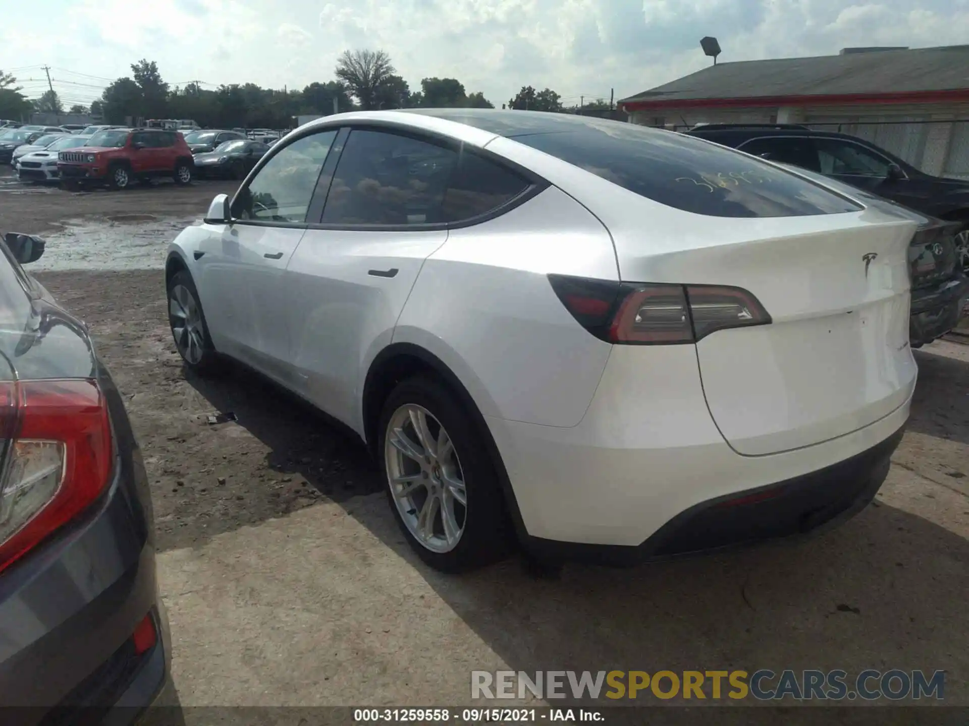 3 Photograph of a damaged car 5YJYGDEEXMF228704 TESLA MODEL Y 2021