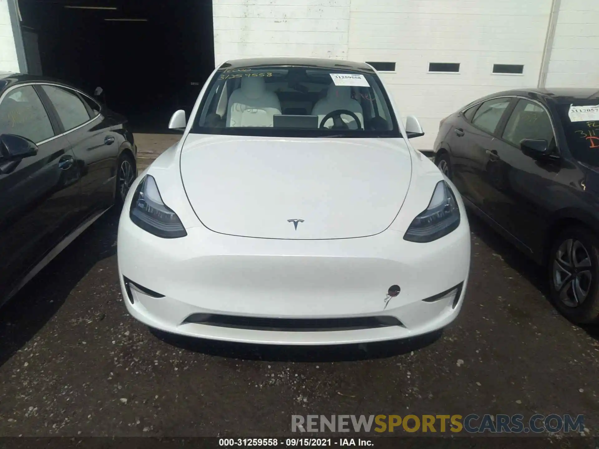 6 Photograph of a damaged car 5YJYGDEEXMF228704 TESLA MODEL Y 2021