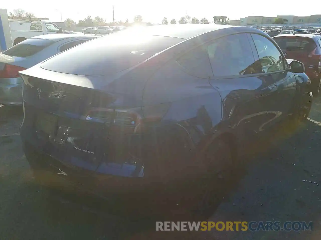 4 Photograph of a damaged car 5YJYGDEEXMF246247 TESLA MODEL Y 2021