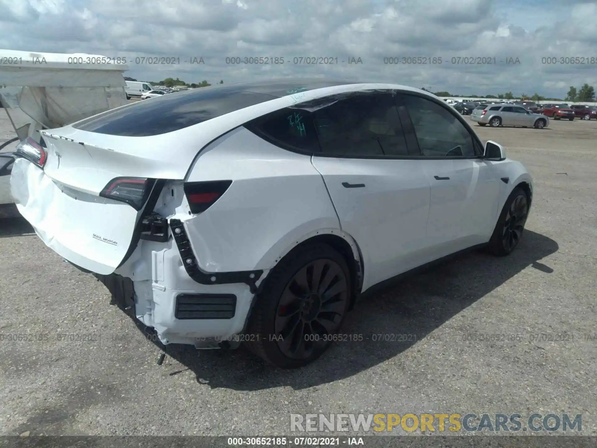 4 Photograph of a damaged car 5YJYGDEF1MF090110 TESLA MODEL Y 2021