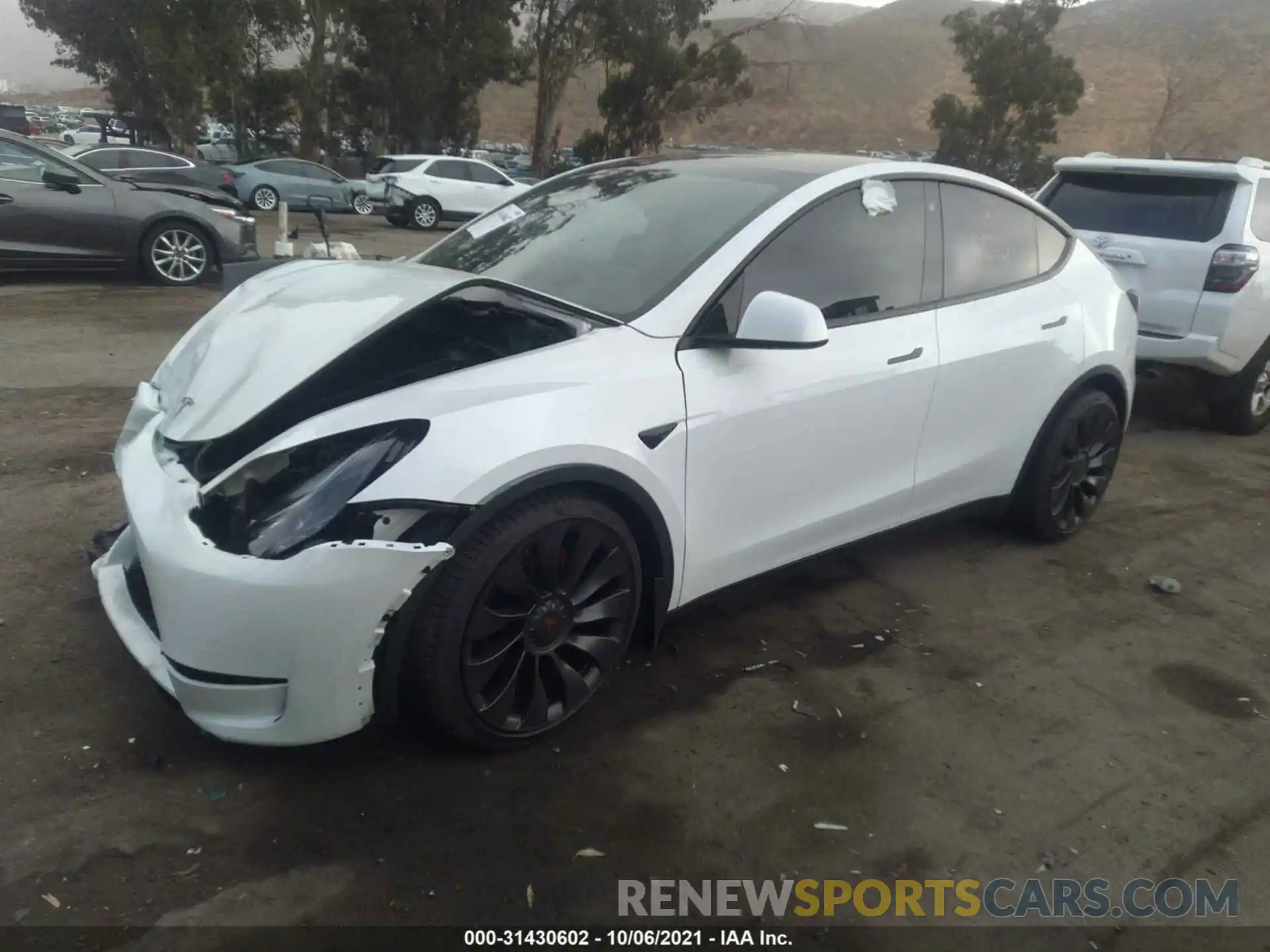 2 Photograph of a damaged car 5YJYGDEF1MF157885 TESLA MODEL Y 2021