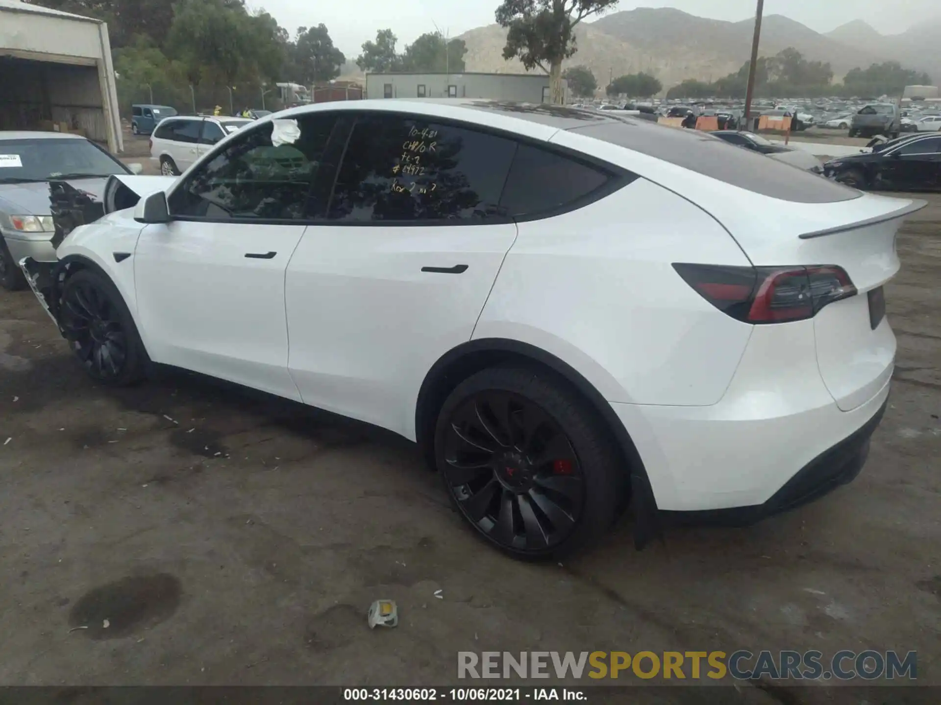 3 Photograph of a damaged car 5YJYGDEF1MF157885 TESLA MODEL Y 2021