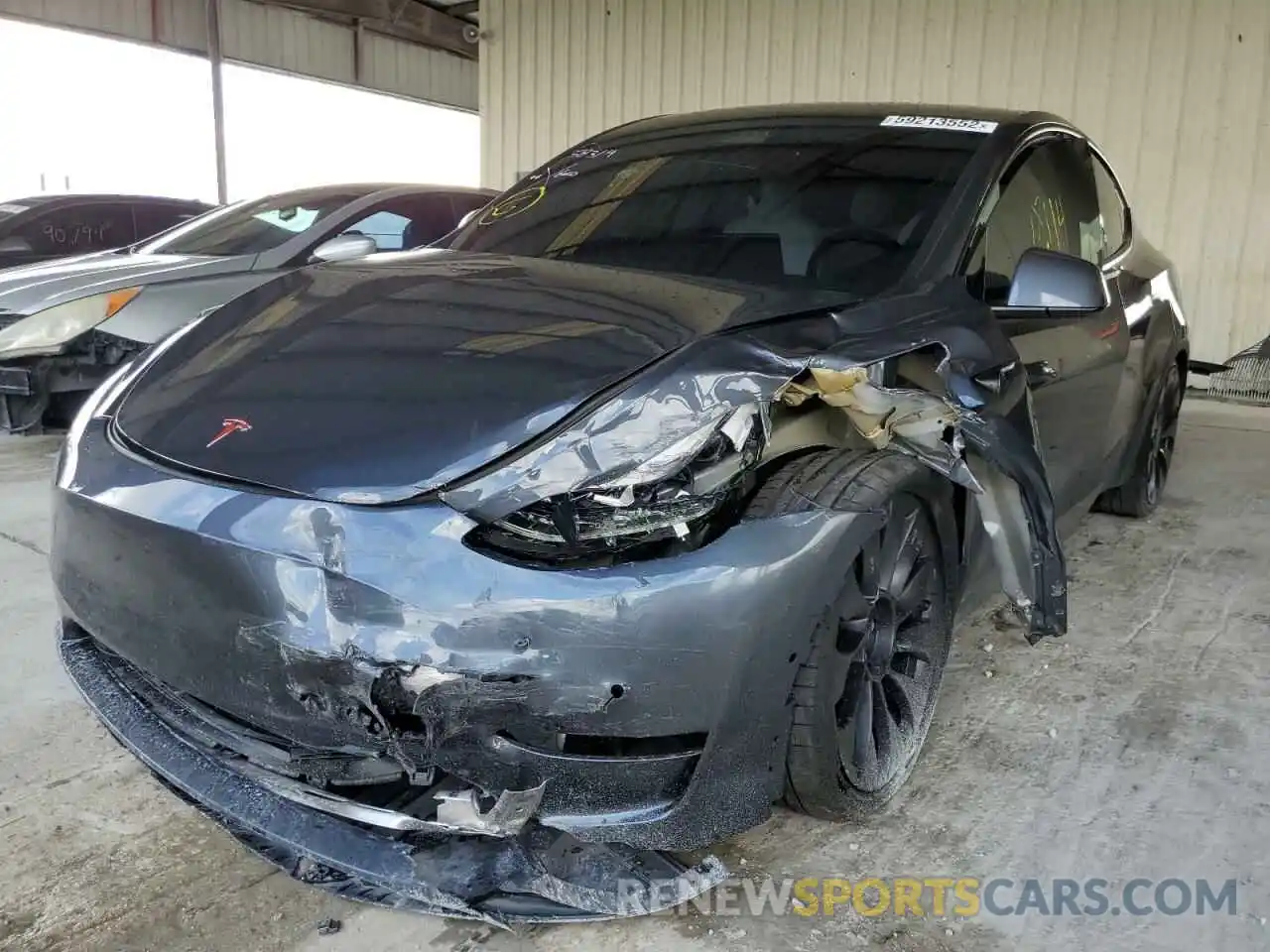 2 Photograph of a damaged car 5YJYGDEF2MF194637 TESLA MODEL Y 2021