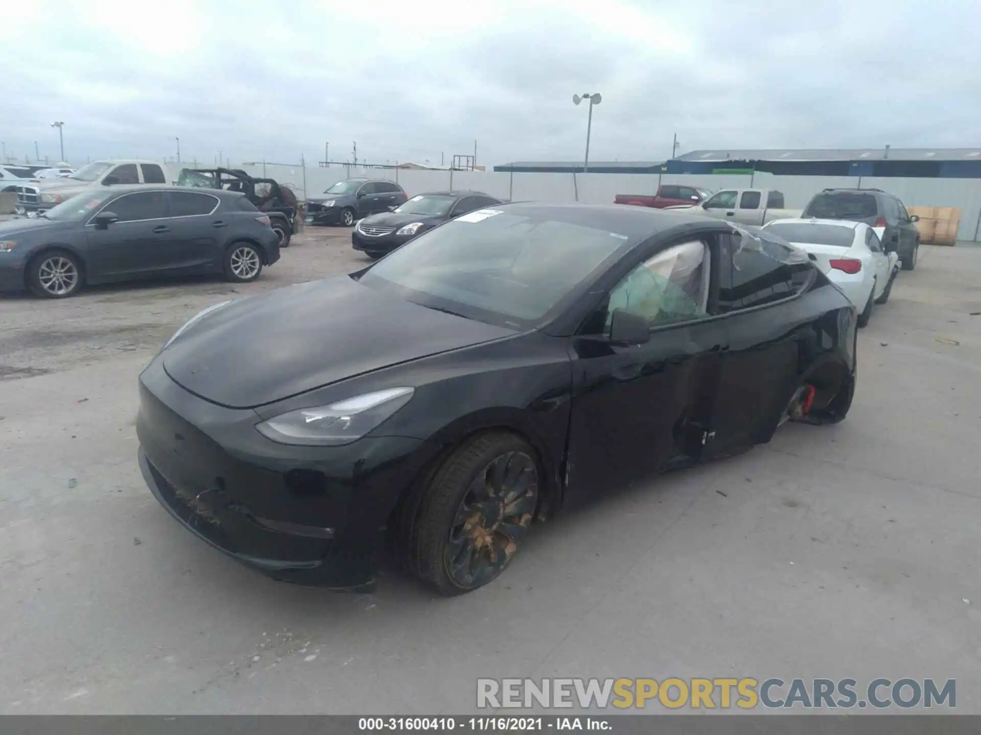 2 Photograph of a damaged car 5YJYGDEF3MF230531 TESLA MODEL Y 2021