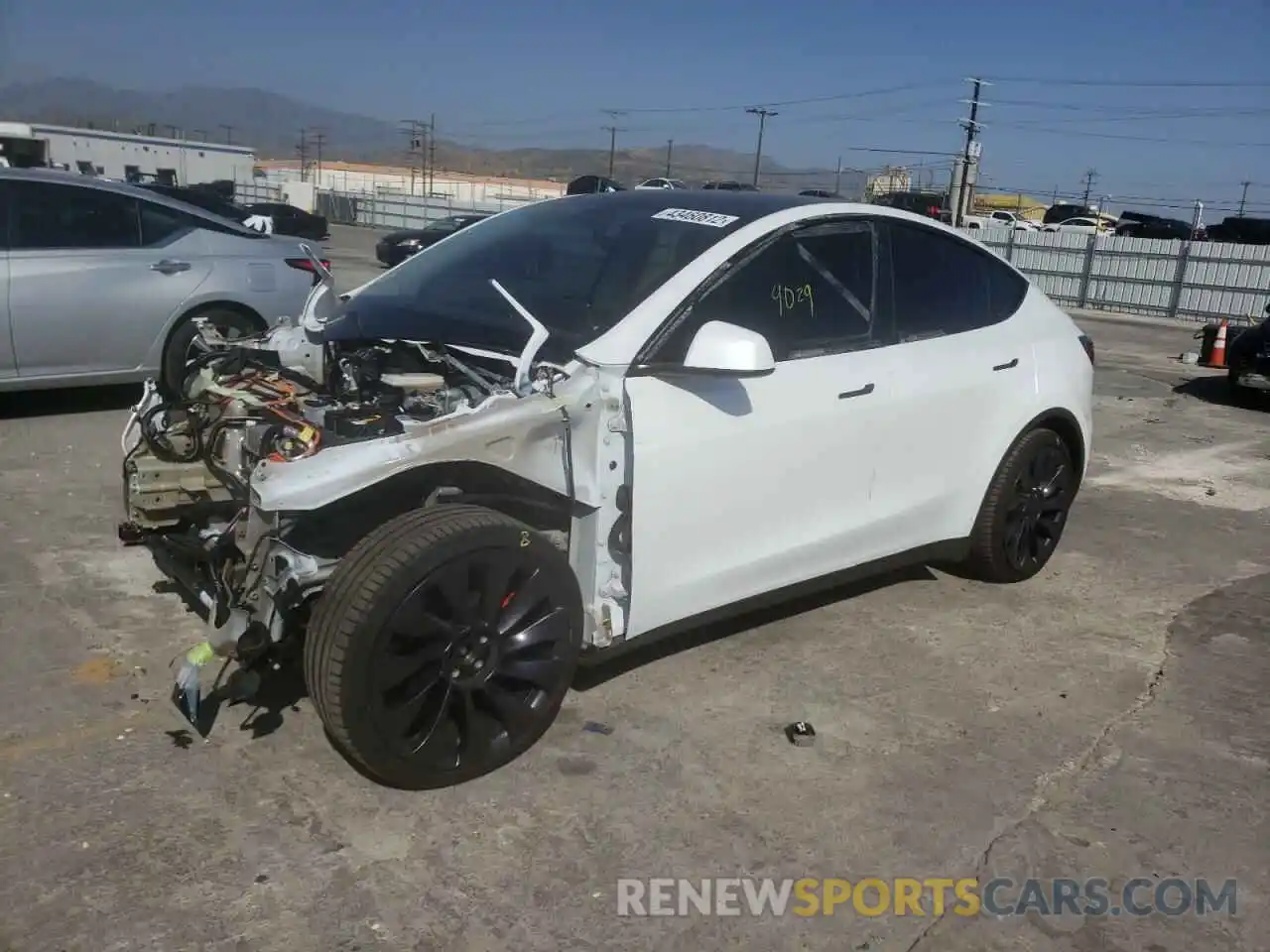 2 Photograph of a damaged car 5YJYGDEF3MF276943 TESLA MODEL Y 2021