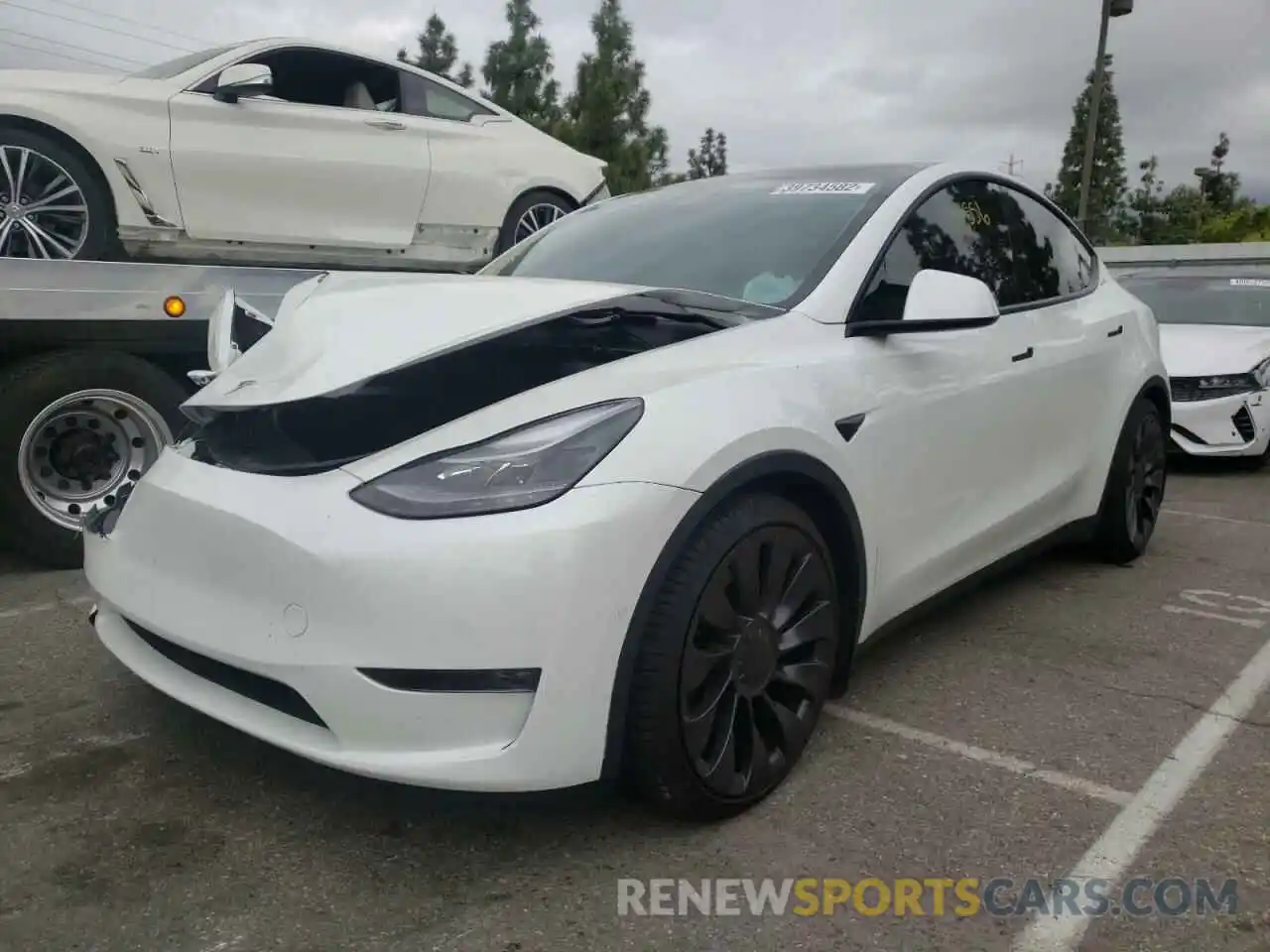 2 Photograph of a damaged car 5YJYGDEF4MF173417 TESLA MODEL Y 2021