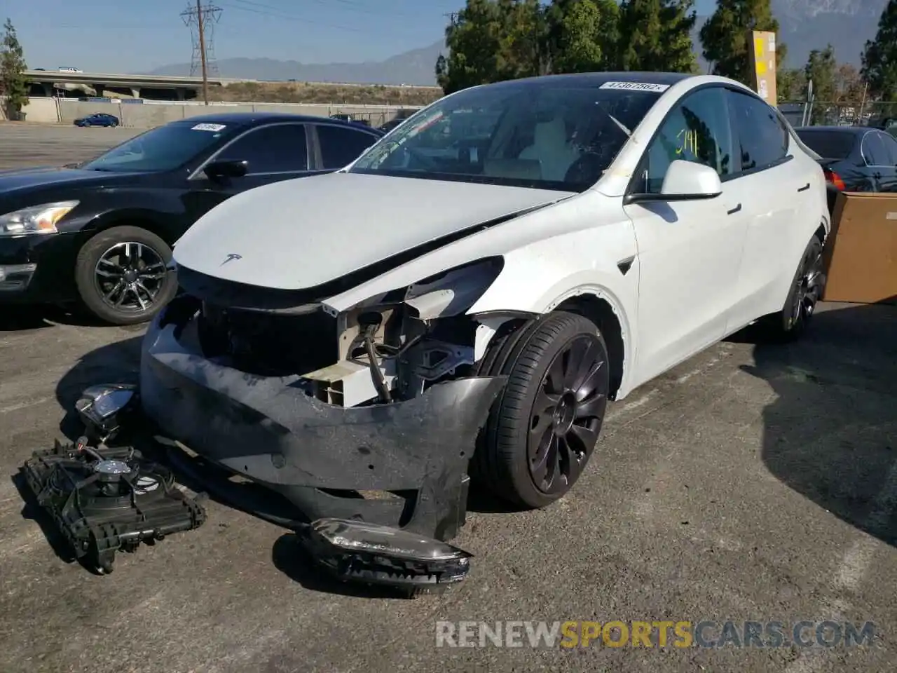 2 Photograph of a damaged car 5YJYGDEF4MF267331 TESLA MODEL Y 2021