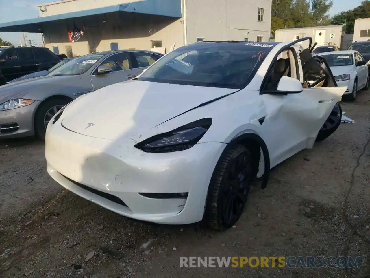 2 Photograph of a damaged car 5YJYGDEF5MF250229 TESLA MODEL Y 2021