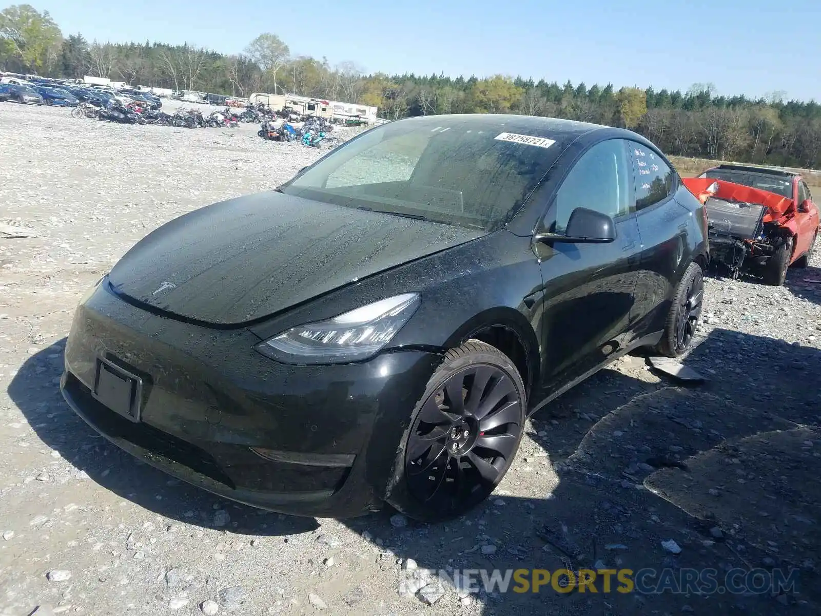 2 Photograph of a damaged car 5YJYGDEF7MF083985 TESLA MODEL Y 2021