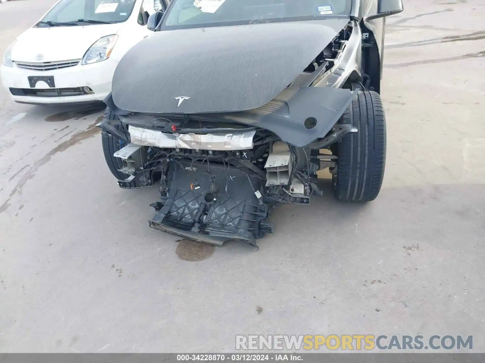 12 Photograph of a damaged car 5YJYGDEF8MF133535 TESLA MODEL Y 2021