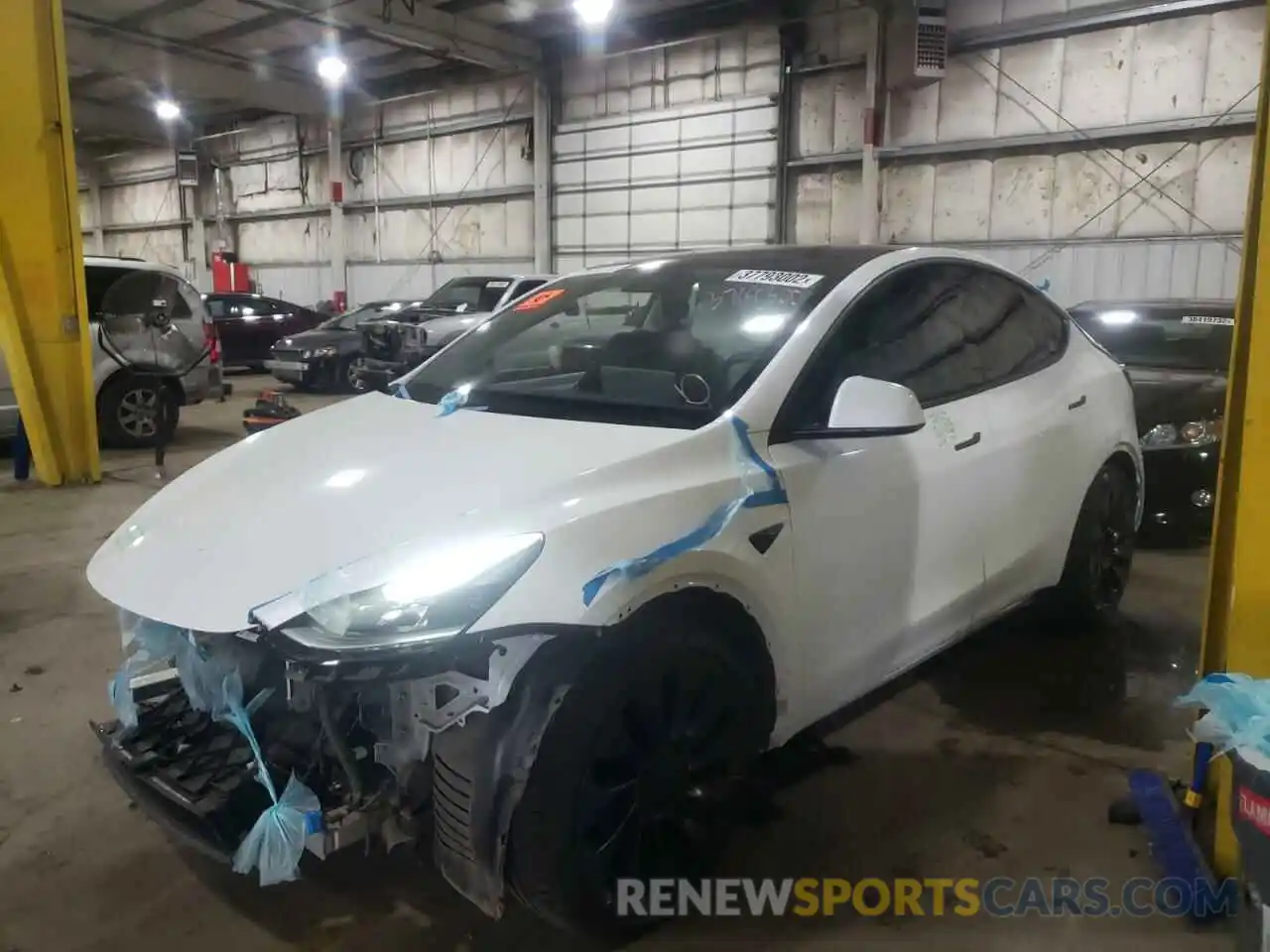 2 Photograph of a damaged car 5YJYGDEF9MF303398 TESLA MODEL Y 2021