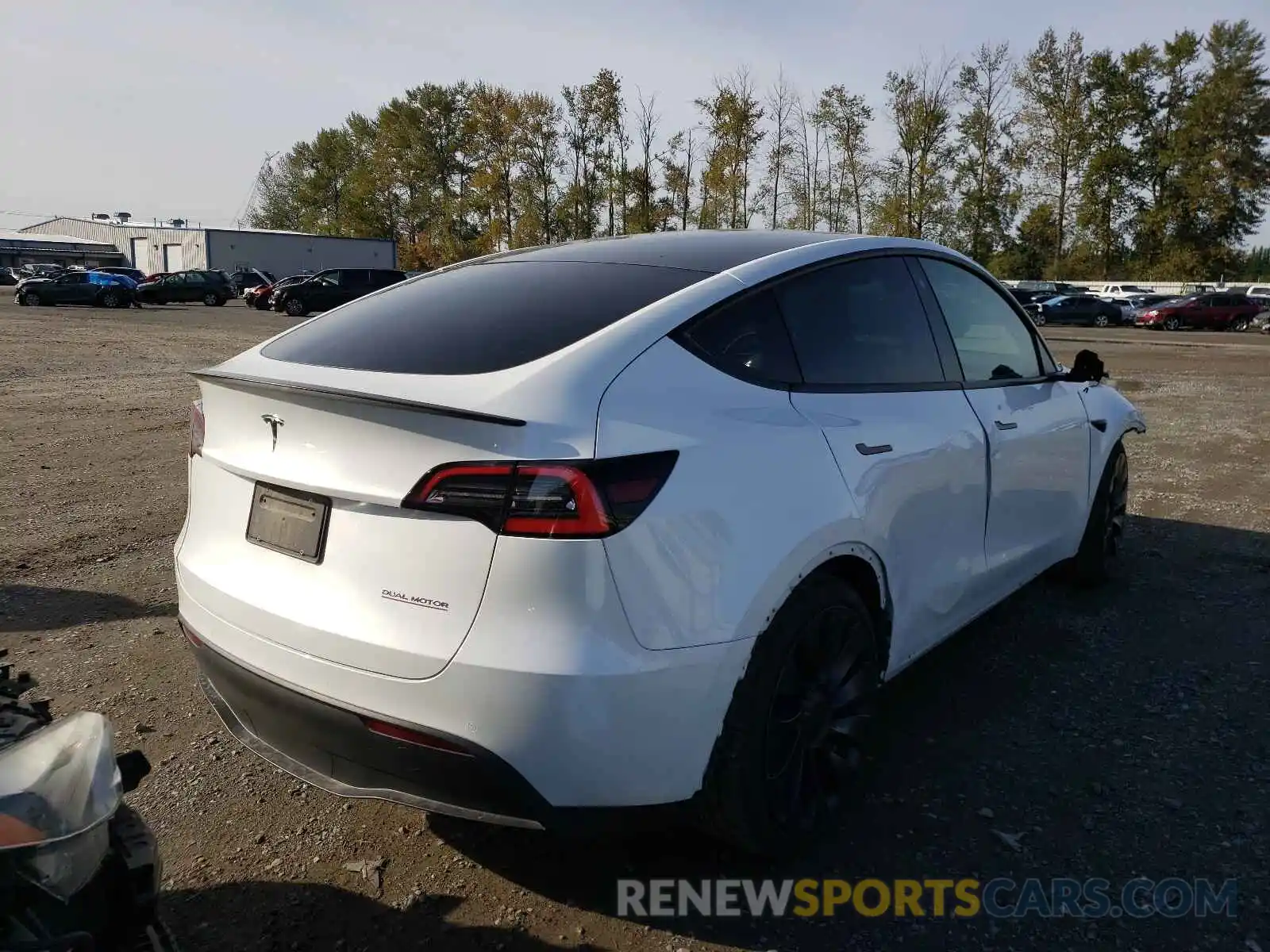 4 Photograph of a damaged car 5YJYGDEFXMF072334 TESLA MODEL Y 2021