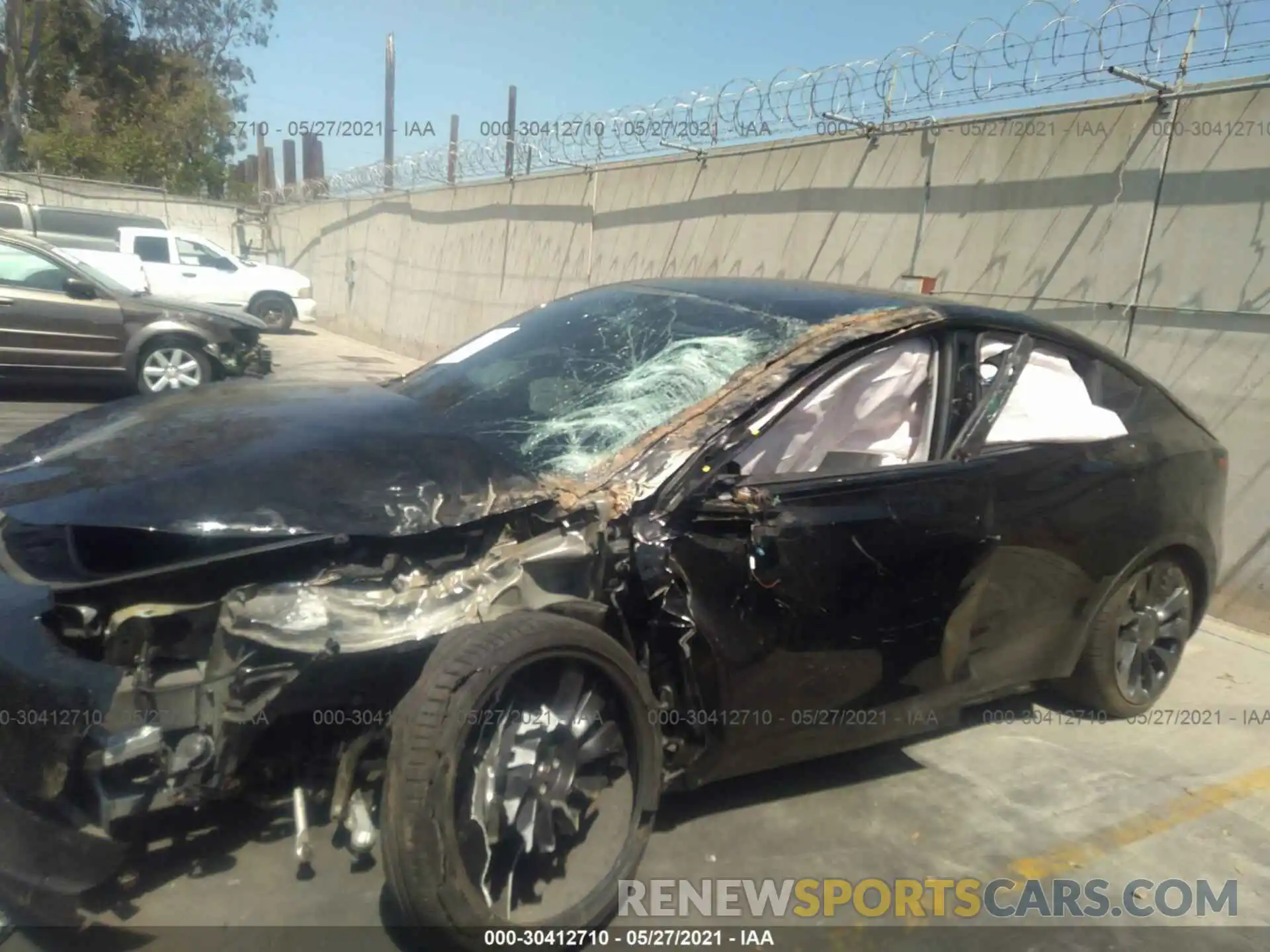 11 Photograph of a damaged car 5YJYGDEFXMF079400 TESLA MODEL Y 2021