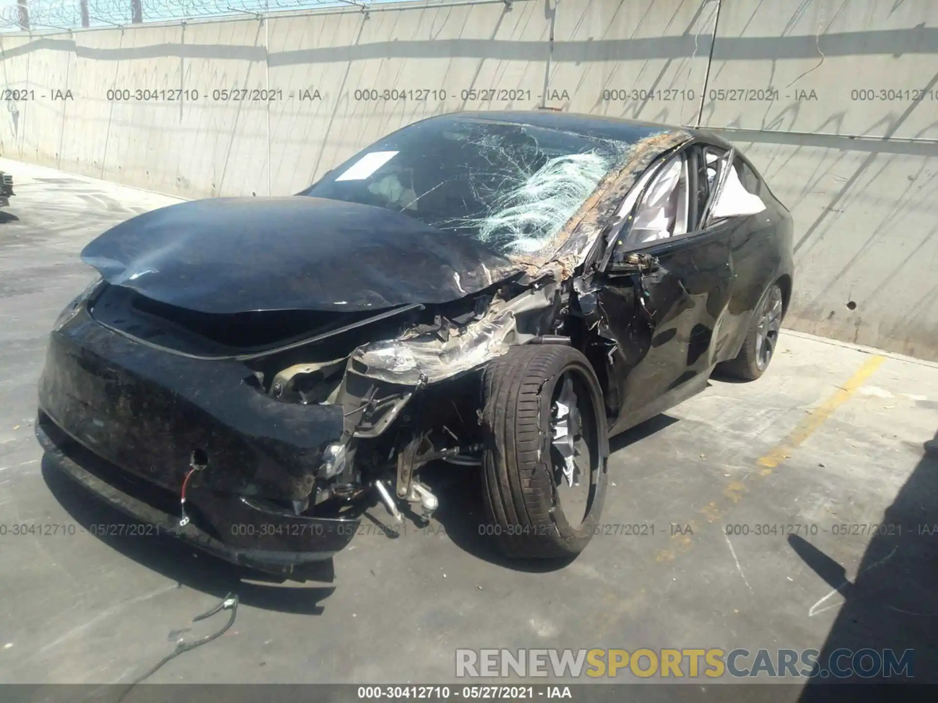 2 Photograph of a damaged car 5YJYGDEFXMF079400 TESLA MODEL Y 2021